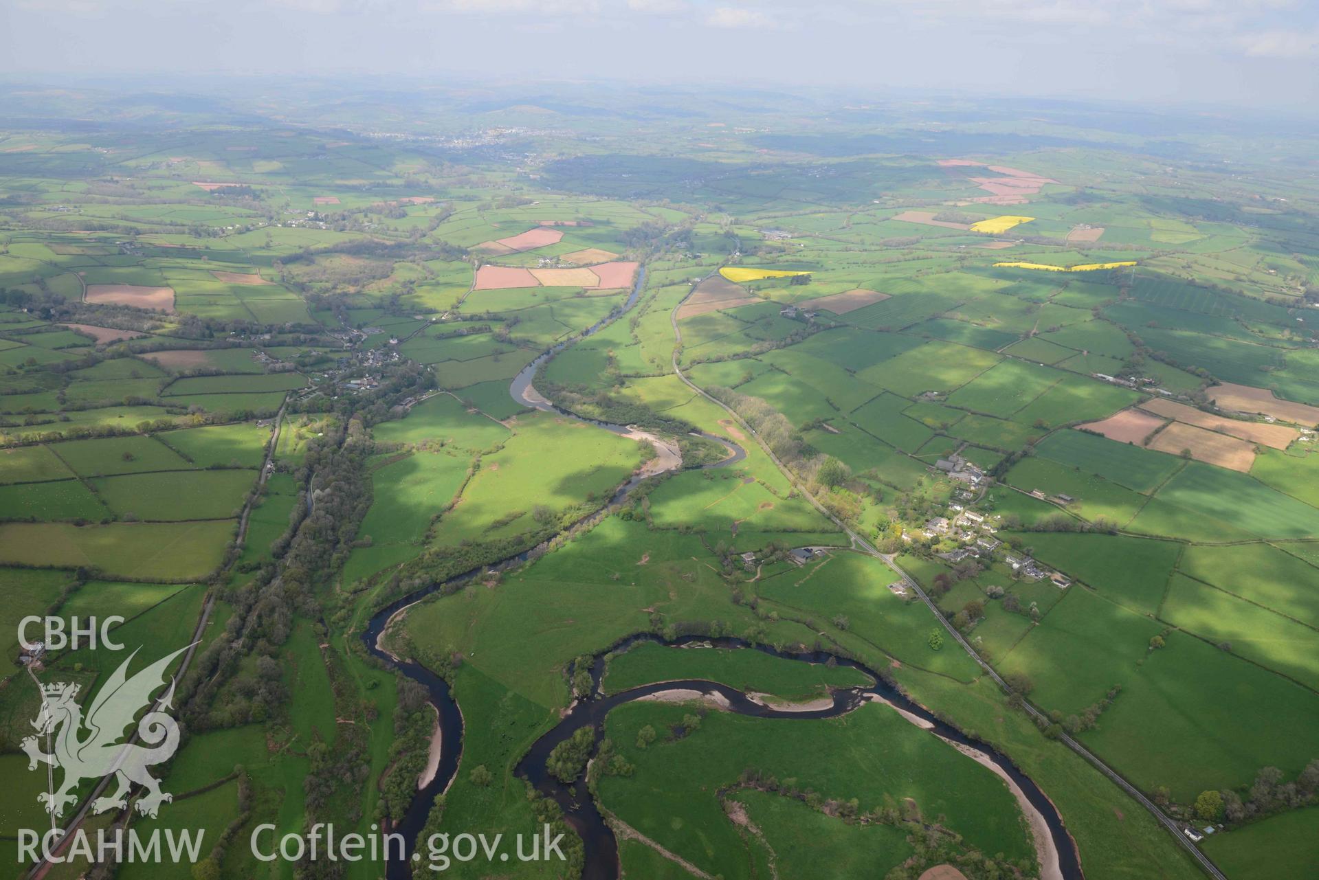 River Usk landscape, looking North West towards Pencelli. Oblique aerial photograph taken during the Royal Commission's programme of archaeological aerial reconnaissance by Toby Driver on 29 April 2022.