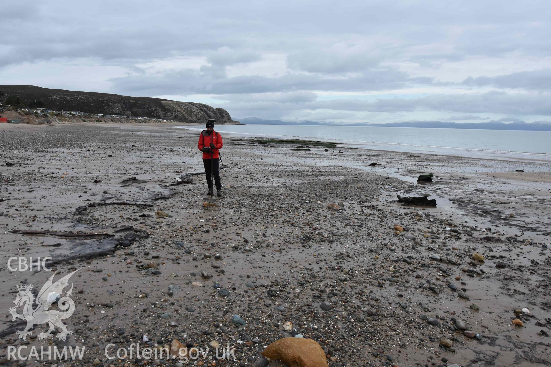 Peat exposure. View looking northeast. Part of a photographic survey of the Submerged Forest, Peat Exposures and Footprints on The Warren Beach, Abersoch, conducted by Louise Barker on 21 January 2019. Produced with EU funds through the Ireland Wales Co-operation Programme 2014-2023. All material made freely available through the Open Government Licence.