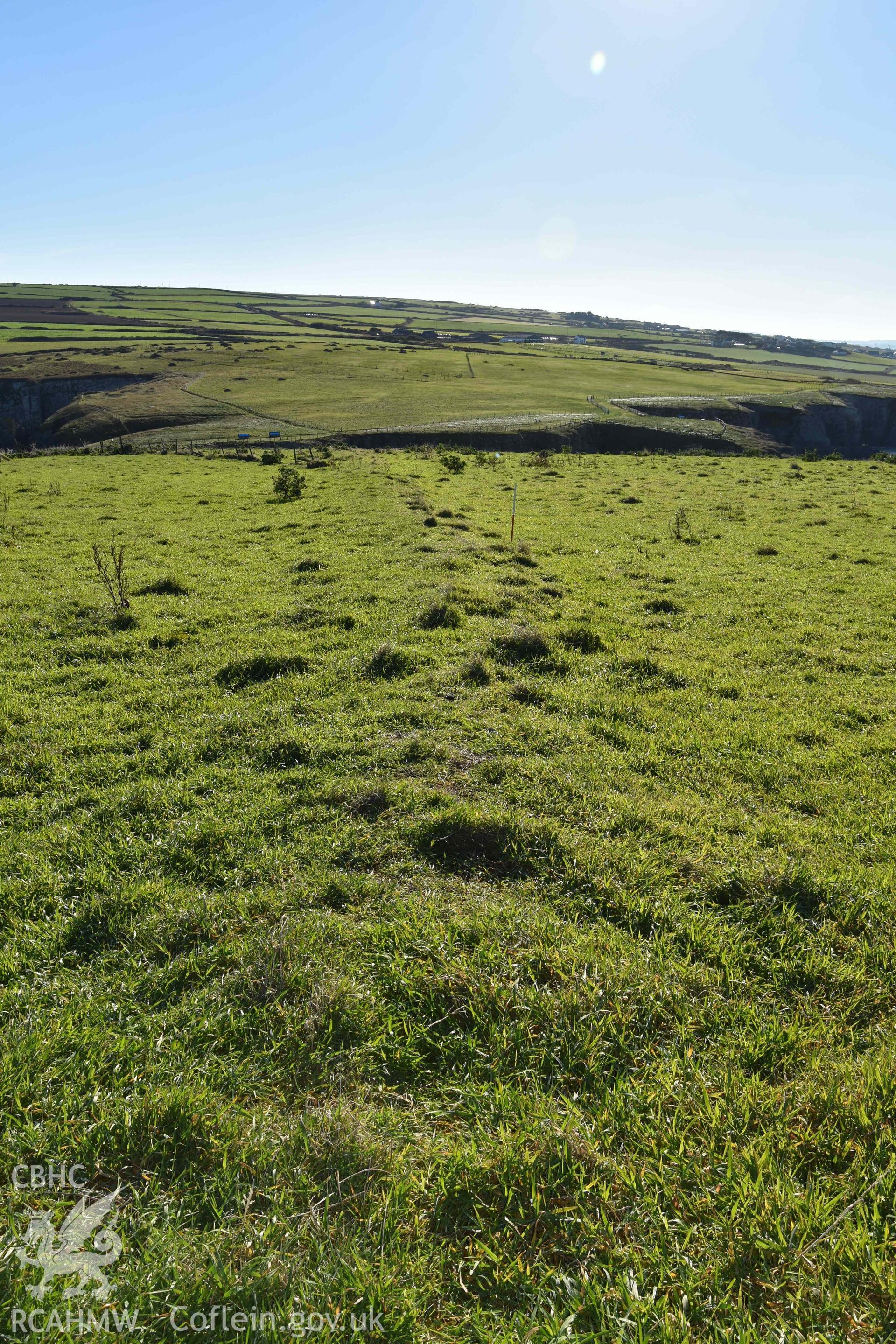 View looking southeast along the bank at the Linnear Bank Crossing on Cardigan Island. Part of photographic survey conducted by Louise Barker of RCAHMW on 30 October 2018. Produced with EU funds through the Ireland Wales Co-operation Programme 2014-2023. All material made freely available through the Open Government Licence.