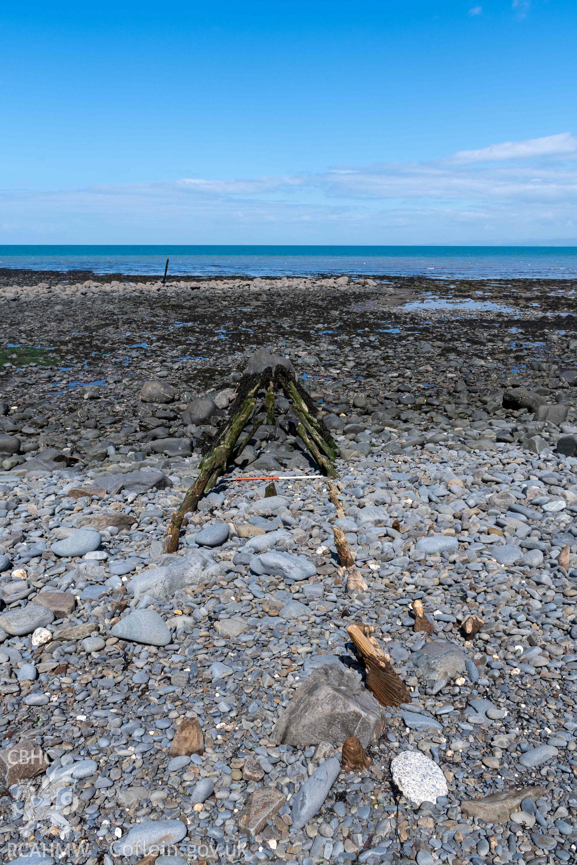 Groyne (SN5174168334) , Aberstrincell, looking north (with scale). Part of photographic survey of Aberstrincell lime kilns and coal yard, conducted by Louise Barker of the RCAHMW survey team on 21 March 2024.