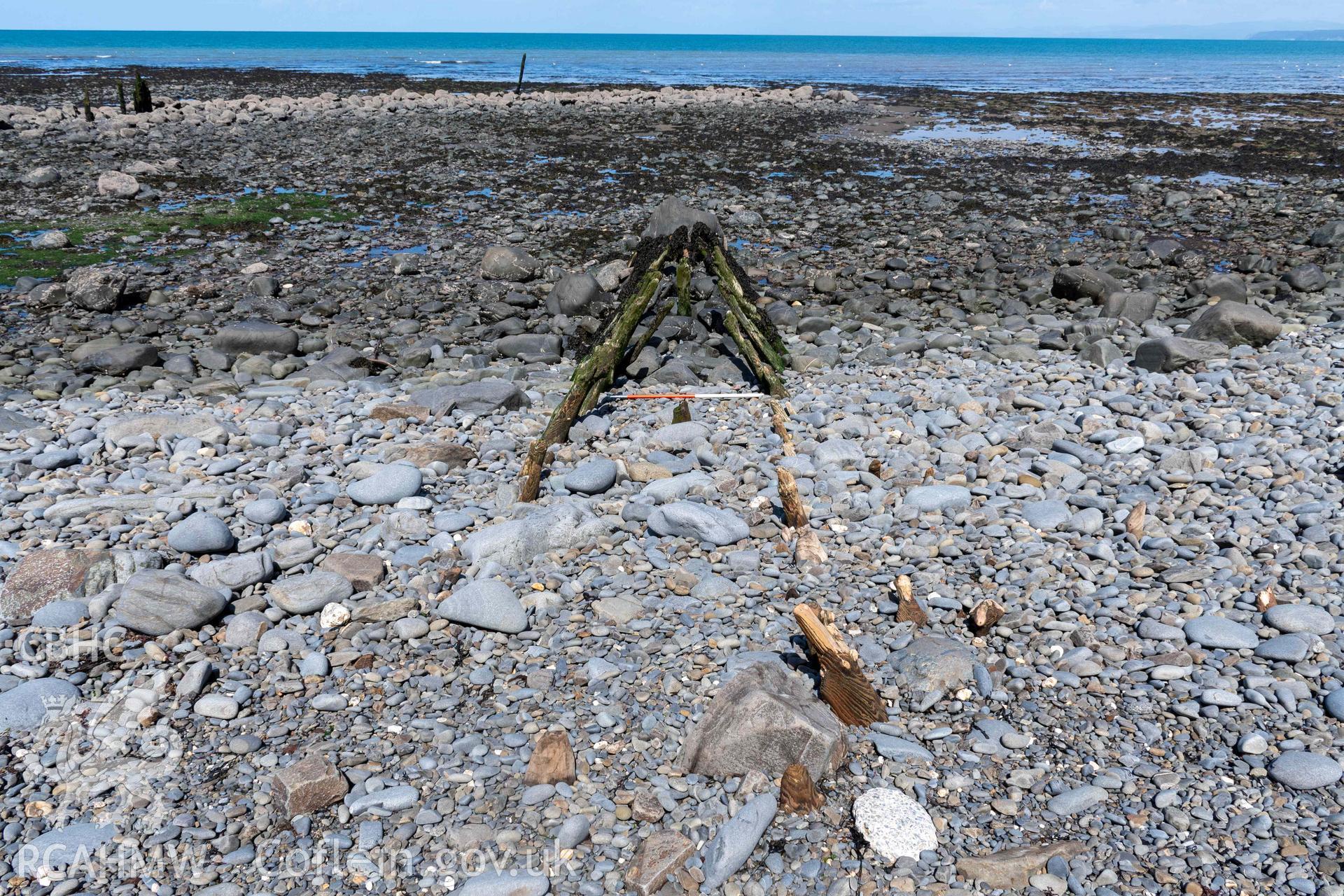 Groyne (SN5174168334) , Aberstrincell, looking north (with scale). Part of photographic survey of Aberstrincell lime kilns and coal yard, conducted by Louise Barker of the RCAHMW survey team on 21 March 2024.