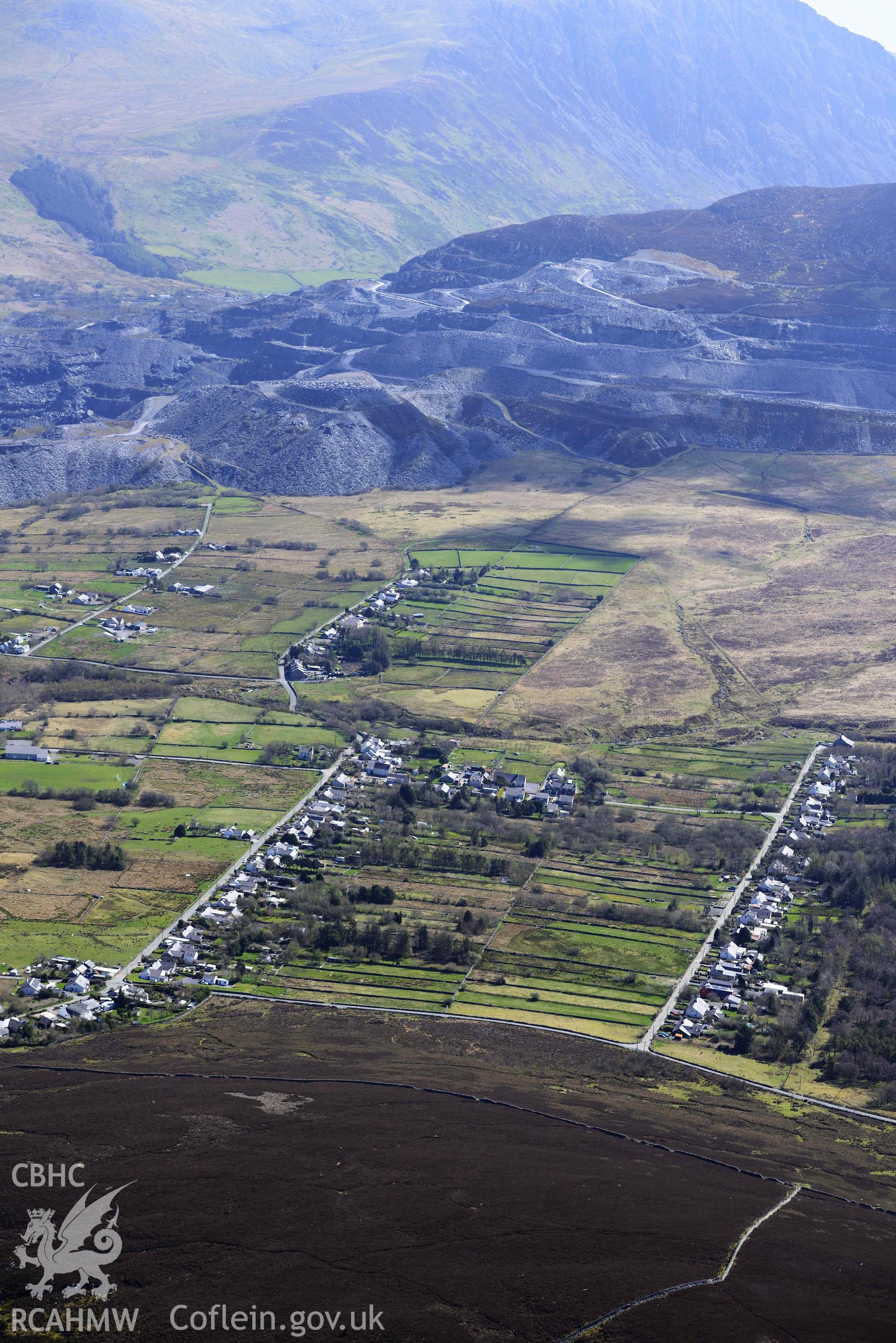 Mynydd Llandygai, terraced housing, view from north-west. Oblique aerial photograph taken during the Royal Commission’s programme of archaeological aerial reconnaissance by Toby Driver on 20 April 2018. (edited)