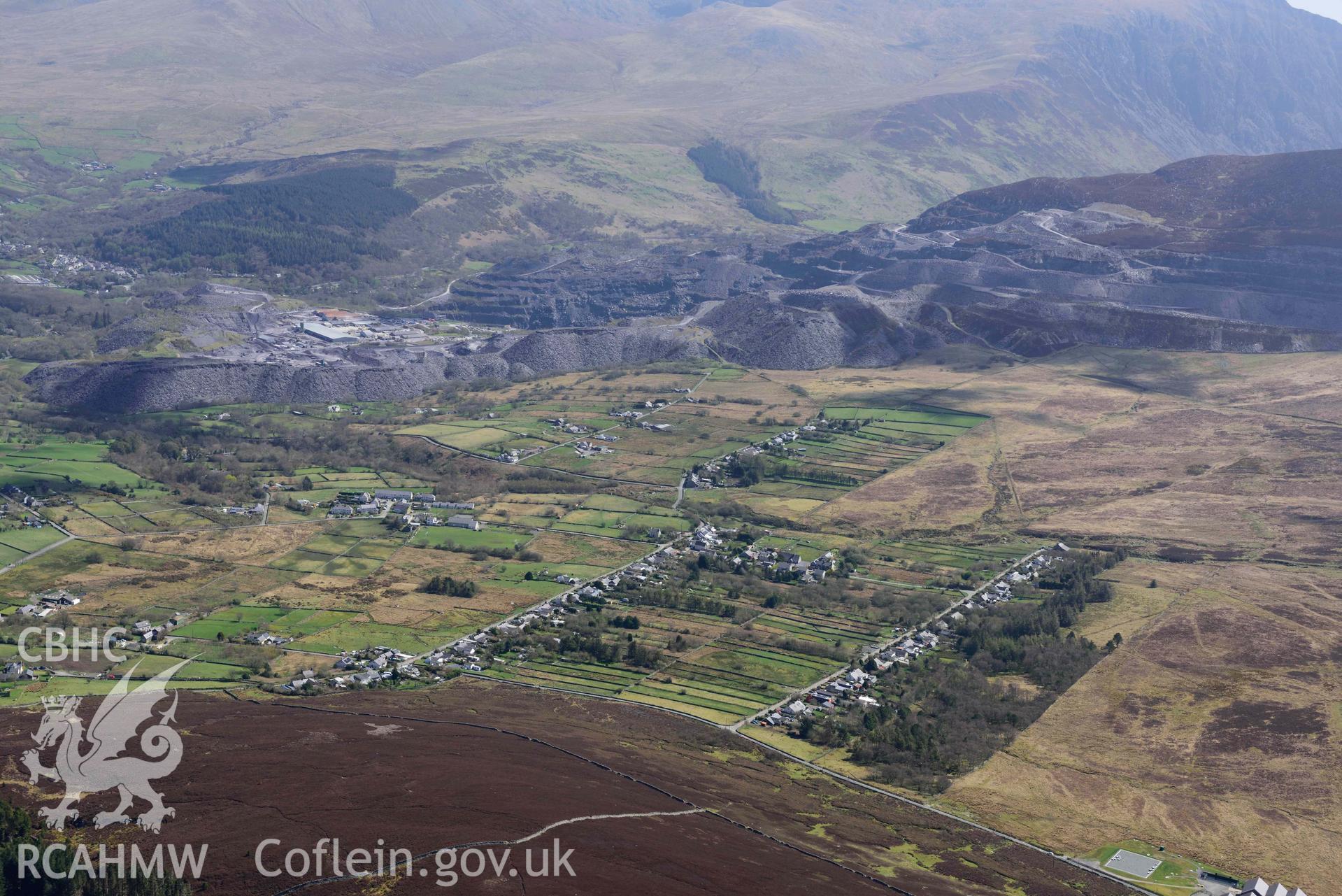Mynydd Llandygai, terraced housing, view from the west. Oblique aerial photograph taken during the Royal Commission’s programme of archaeological aerial reconnaissance by Toby Driver on 20 April 2018. (edited)