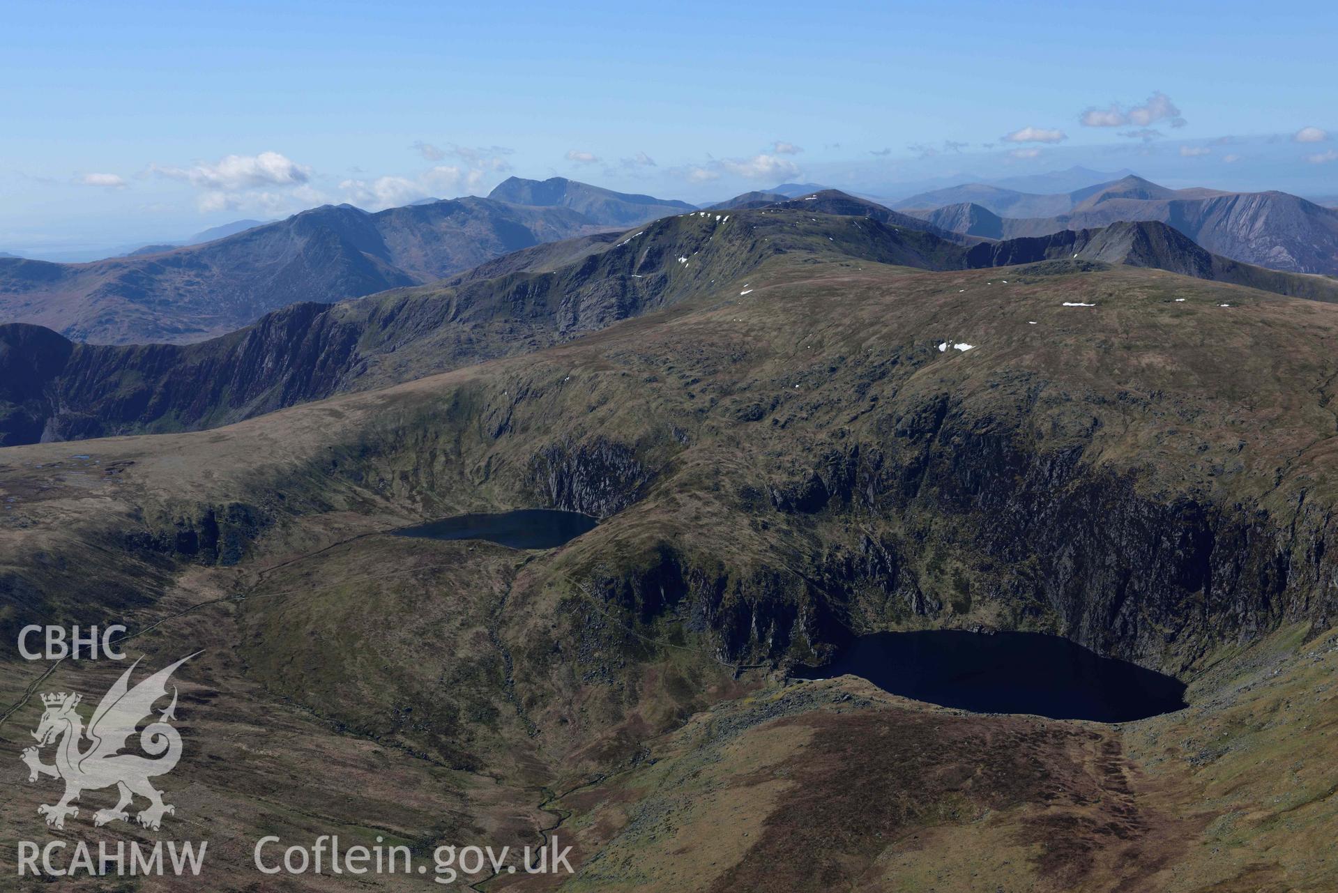 Llyn Dulyn Reservoir, and Melynllyn, mountain landscape from North East. Oblique aerial photograph taken during the Royal Commission’s programme of archaeological aerial reconnaissance by Toby Driver on 20 April 2018.