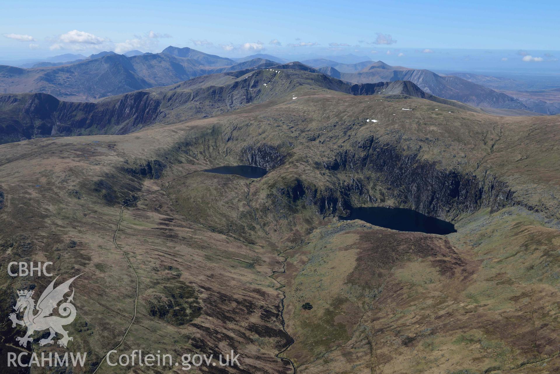 Llyn Dulyn Reservoir, and Melynllyn, mountain landscape. Oblique aerial photograph taken during the Royal Commission’s programme of archaeological aerial reconnaissance by Toby Driver on 20 April 2018.