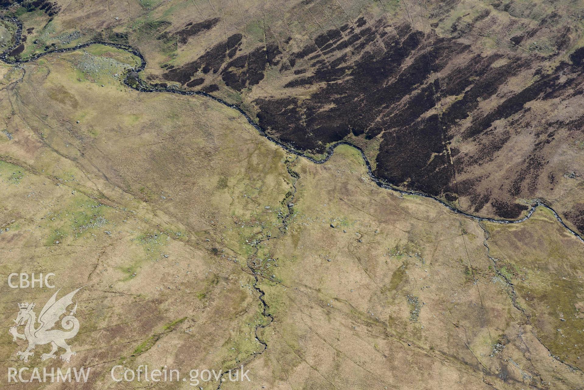 Pant-y-Griafolen, deserted settlement, view from the north west. Oblique aerial photograph taken during the Royal Commission’s programme of archaeological aerial reconnaissance by Toby Driver on 20 April 2018.