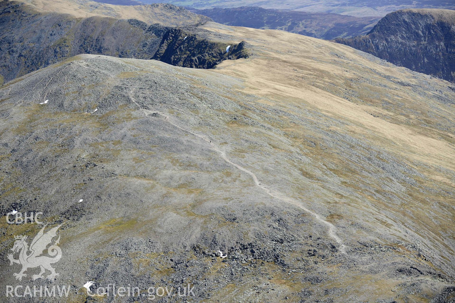 Carnedd Dafydd, cairn to south-west of summit, and summit cairn, view from south-west. Oblique aerial photograph taken during the Royal Commission’s programme of archaeological aerial reconnaissance by Toby Driver on 20 April 2018.