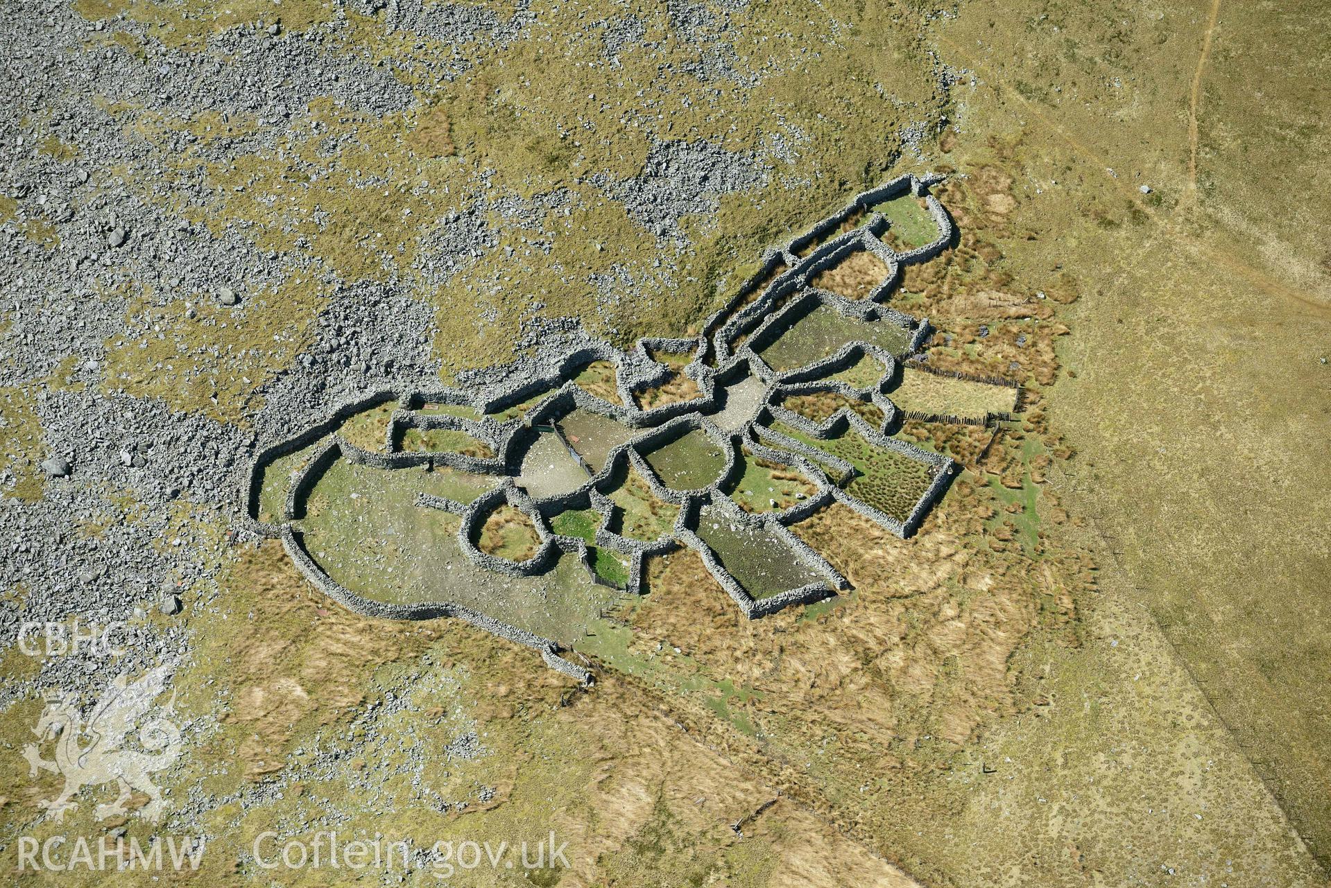 Gyrn, multicellular sheepfold. Oblique aerial photograph taken during the Royal Commission’s programme of archaeological aerial reconnaissance by Toby Driver on 20 April 2018.