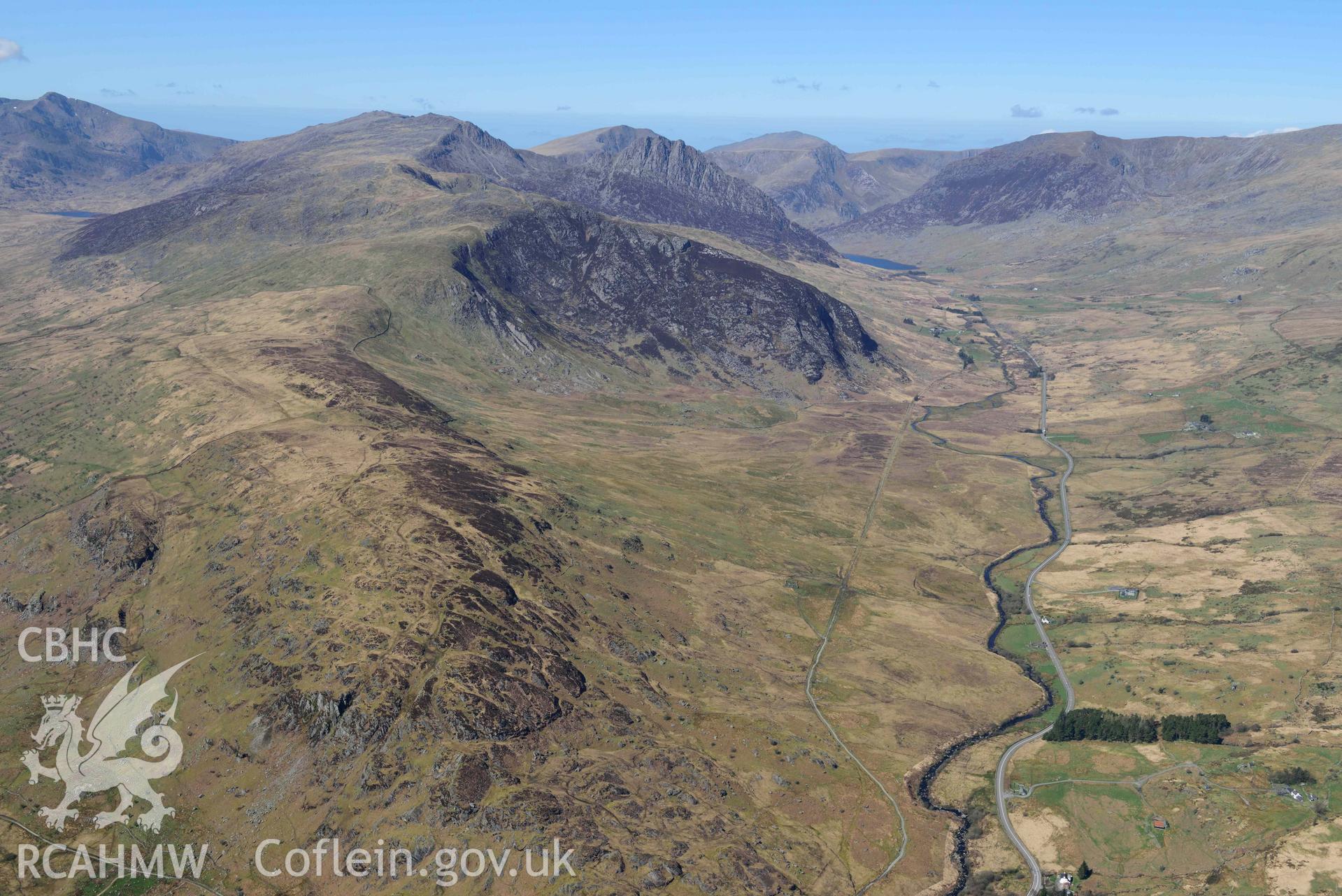 Afon Llugwy valley, wide landscape north-west towards Tryfan.  Oblique aerial photograph taken during the Royal Commission’s programme of archaeological aerial reconnaissance by Toby Driver on 20 April 2018.
