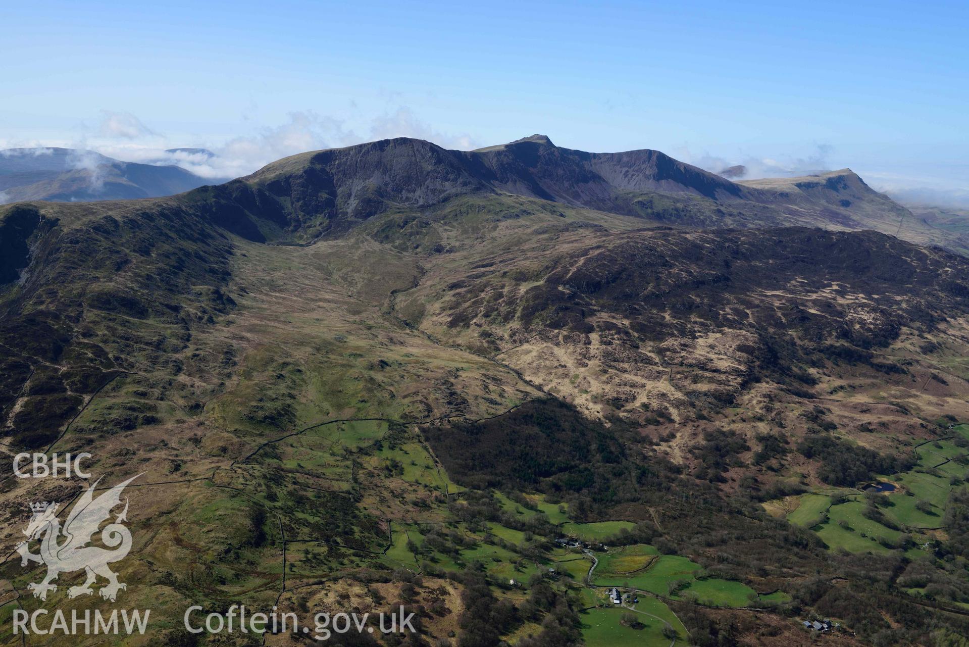 Cader Idris, panoramic landscape of northern escarpment, view north-east over Maes-coch. Oblique aerial photograph taken during the Royal Commission’s programme of archaeological aerial reconnaissance by Toby Driver on 20 April 2018.