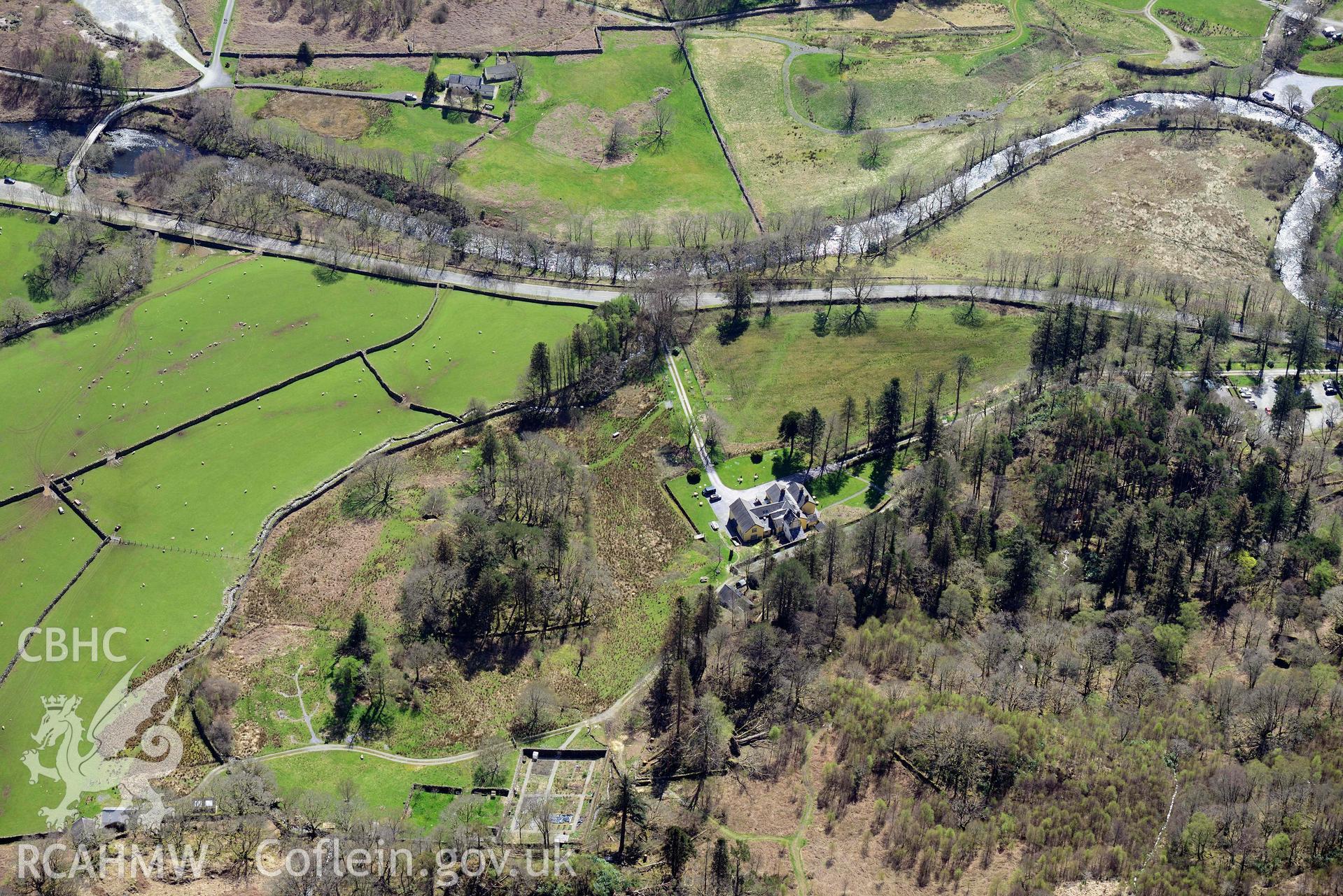 Craflwyn Hall and Park. Oblique aerial photograph taken during the Royal Commission’s programme of archaeological aerial reconnaissance by Toby Driver on 20 April 2018.
