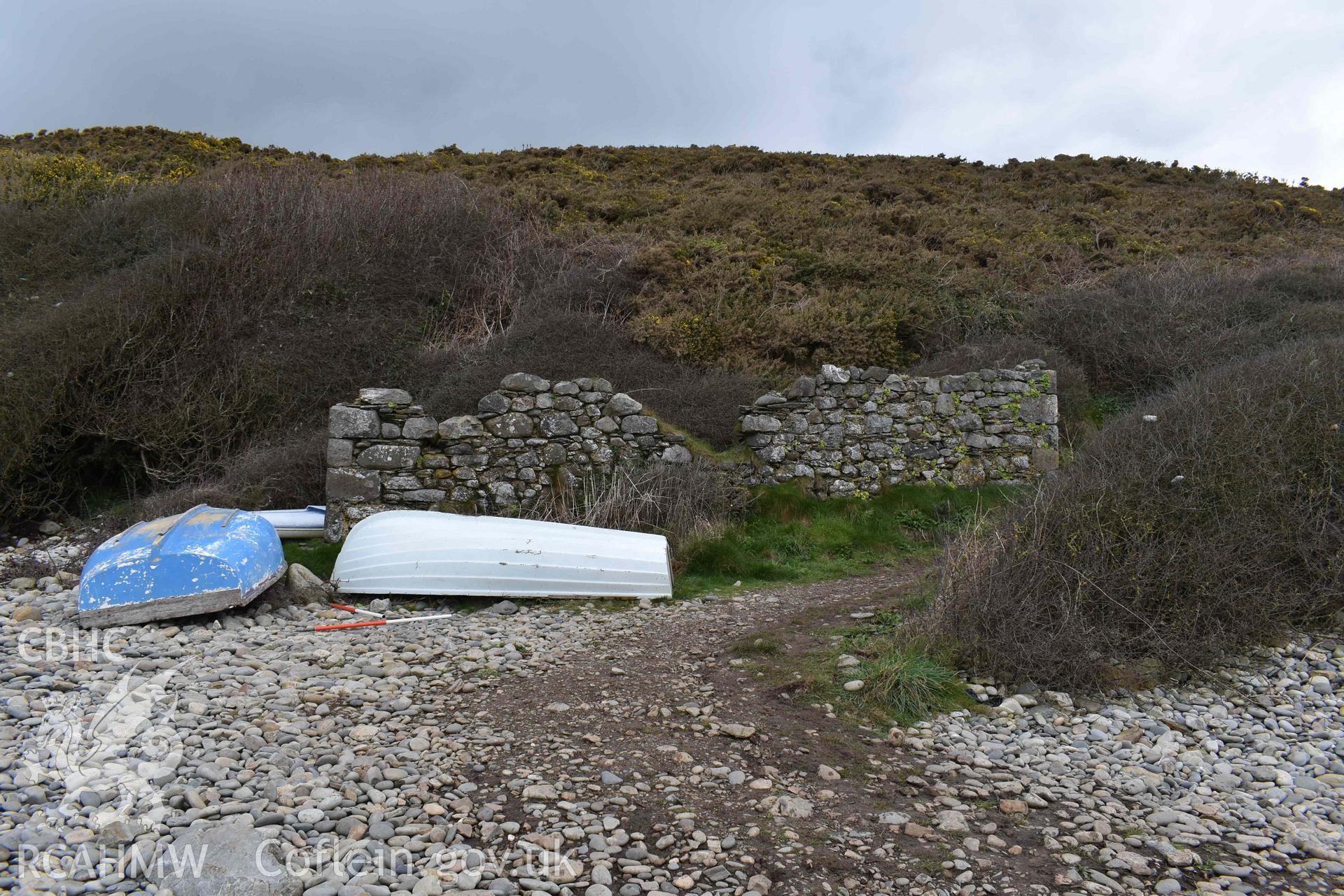 South-facing elevation of the ruined boathouse at Aber Bach on the 02/04/2024. Scales are 1m. Produced by Julian Whitewright of the RCAHMW Survey Team.