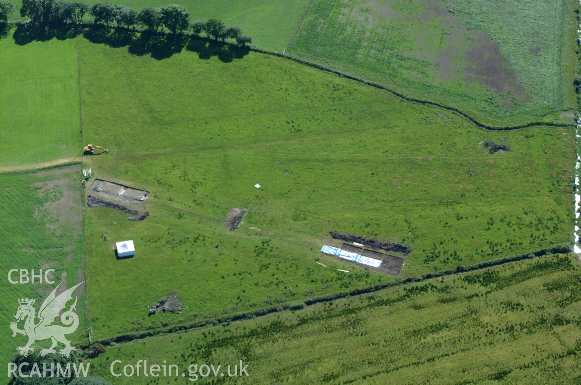 RCAHMW colour oblique aerial photograph of Llangynfelin Timber Trackway taken on 14/06/2004 by Toby Driver