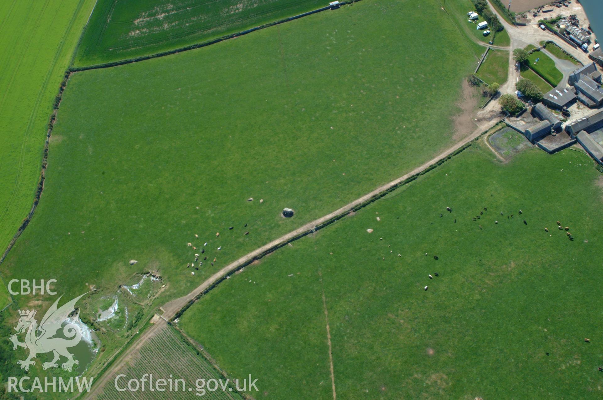 RCAHMW colour oblique aerial photograph of Carreg Samson Burial Chamber taken on 25/05/2004 by Toby Driver