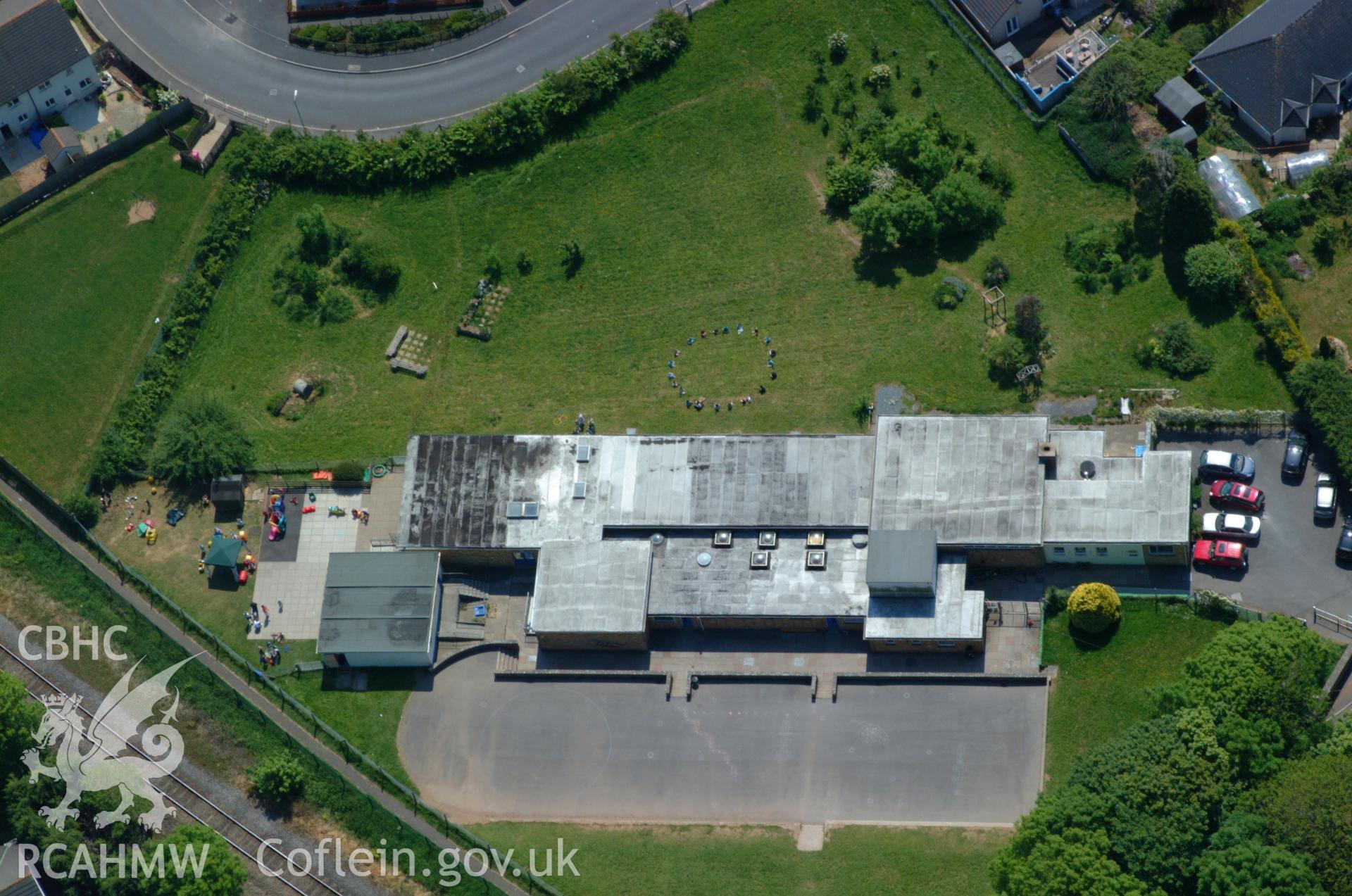 RCAHMW colour oblique aerial photograph of Golden Manor Infants School, Pembroke. Taken on 24 May 2004 by Toby Driver