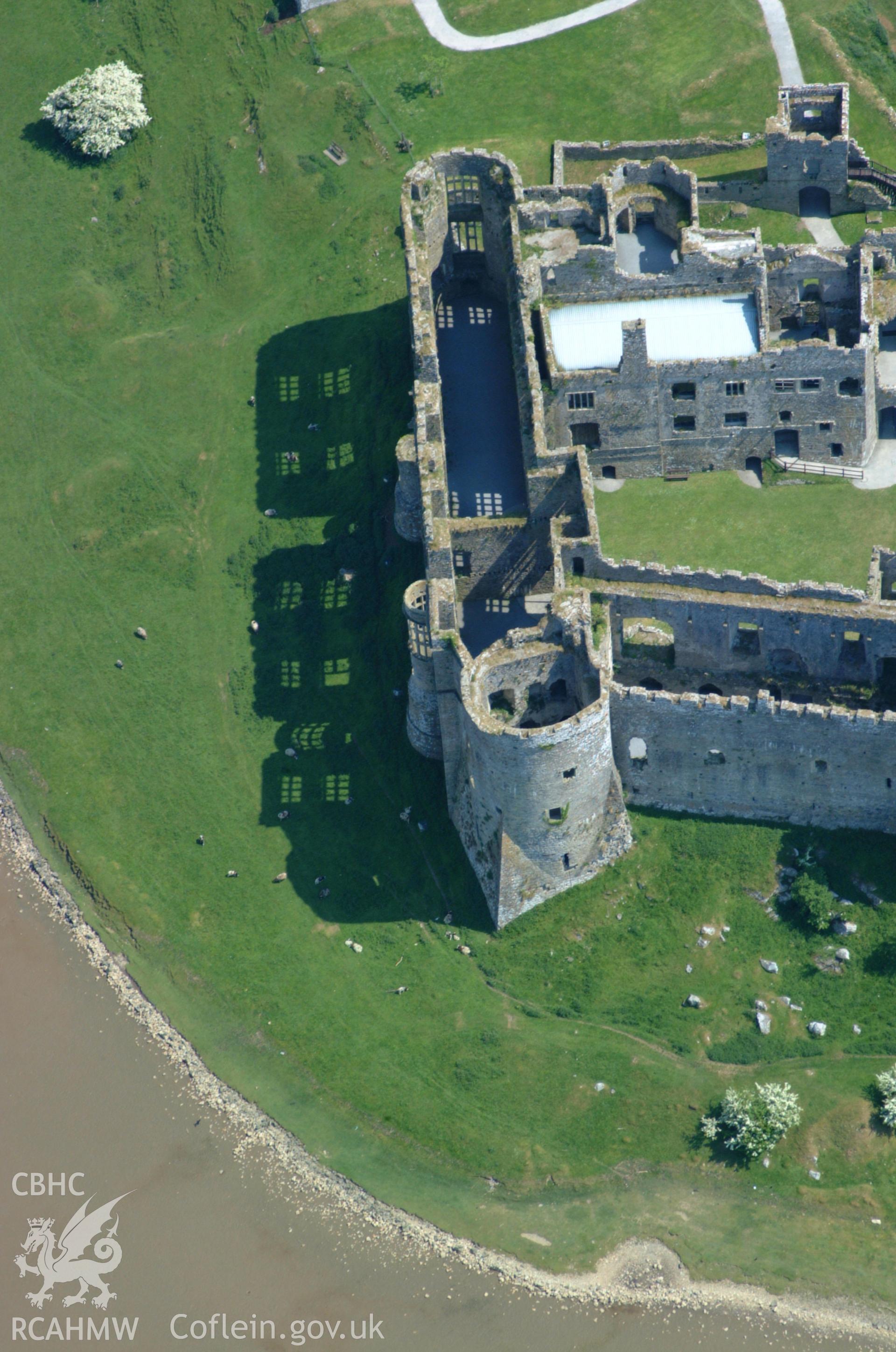 RCAHMW colour oblique aerial photograph of Carew Castle taken on 24/05/2004 by Toby Driver