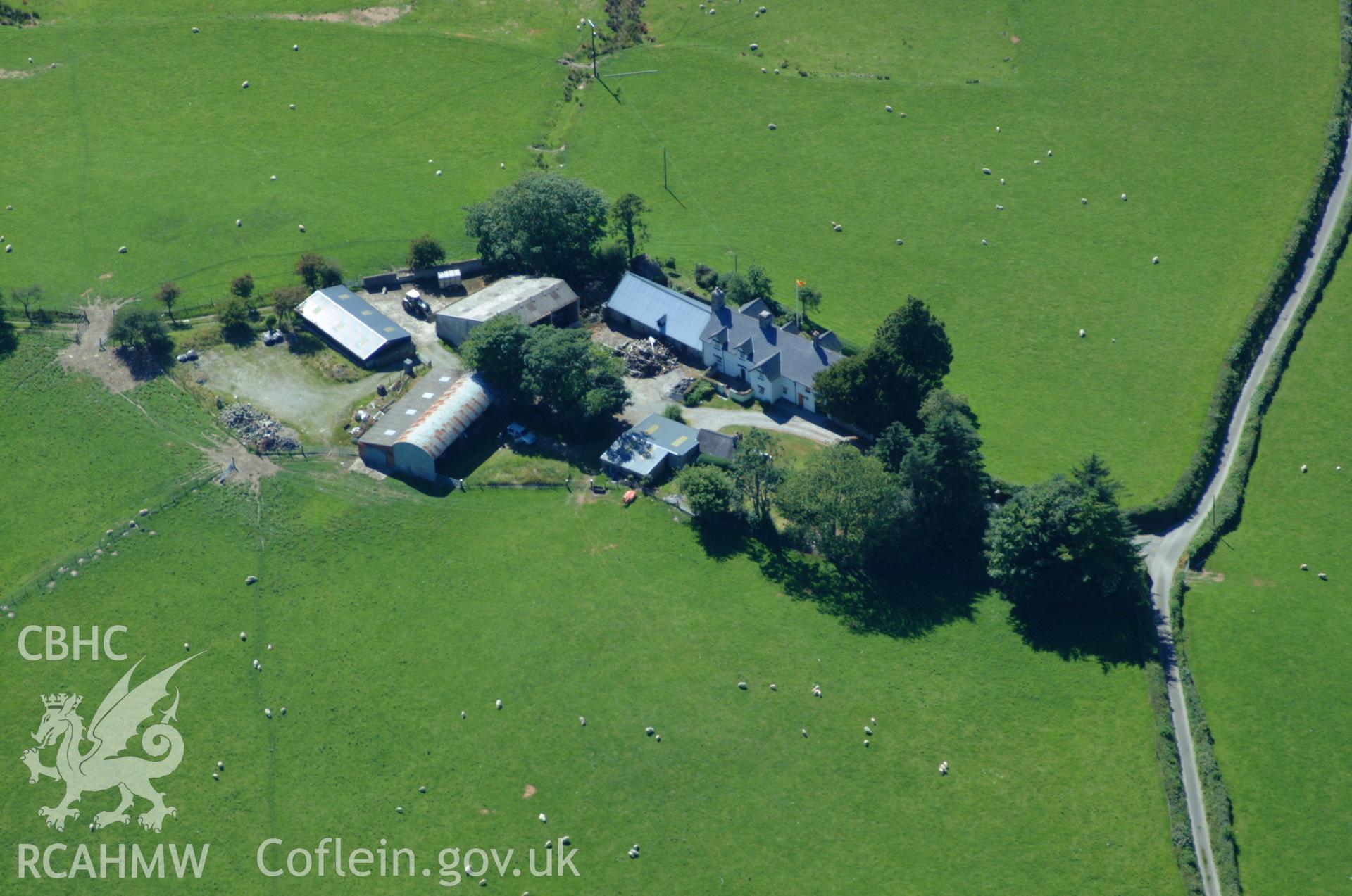 RCAHMW colour oblique aerial photograph of Cefn Caer Farmhouse, Pennal taken on 14/06/2004 by Toby Driver