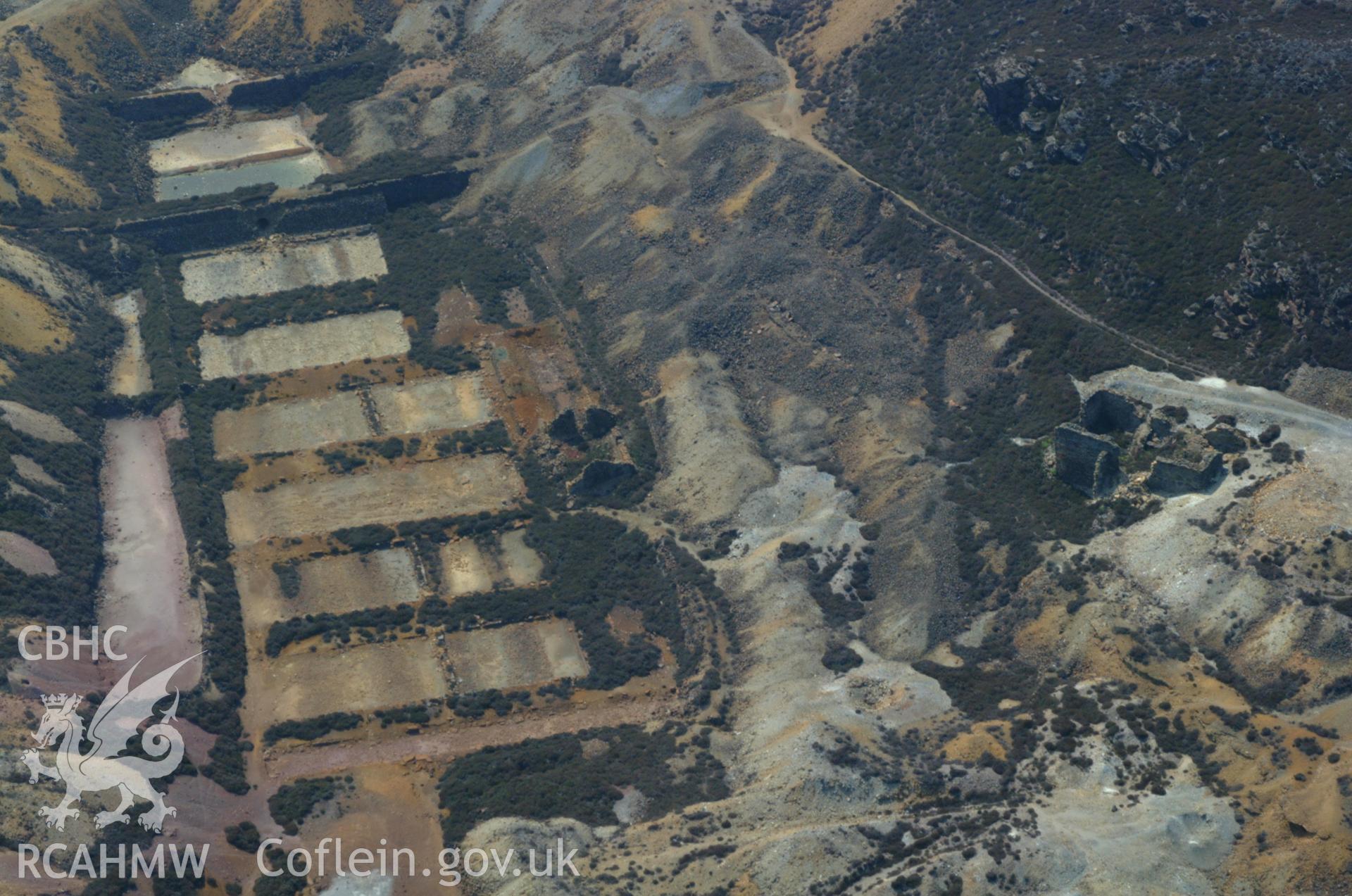 RCAHMW colour oblique aerial photograph of Parys Copper Mine, Amlwch taken on 26/05/2004 by Toby Driver