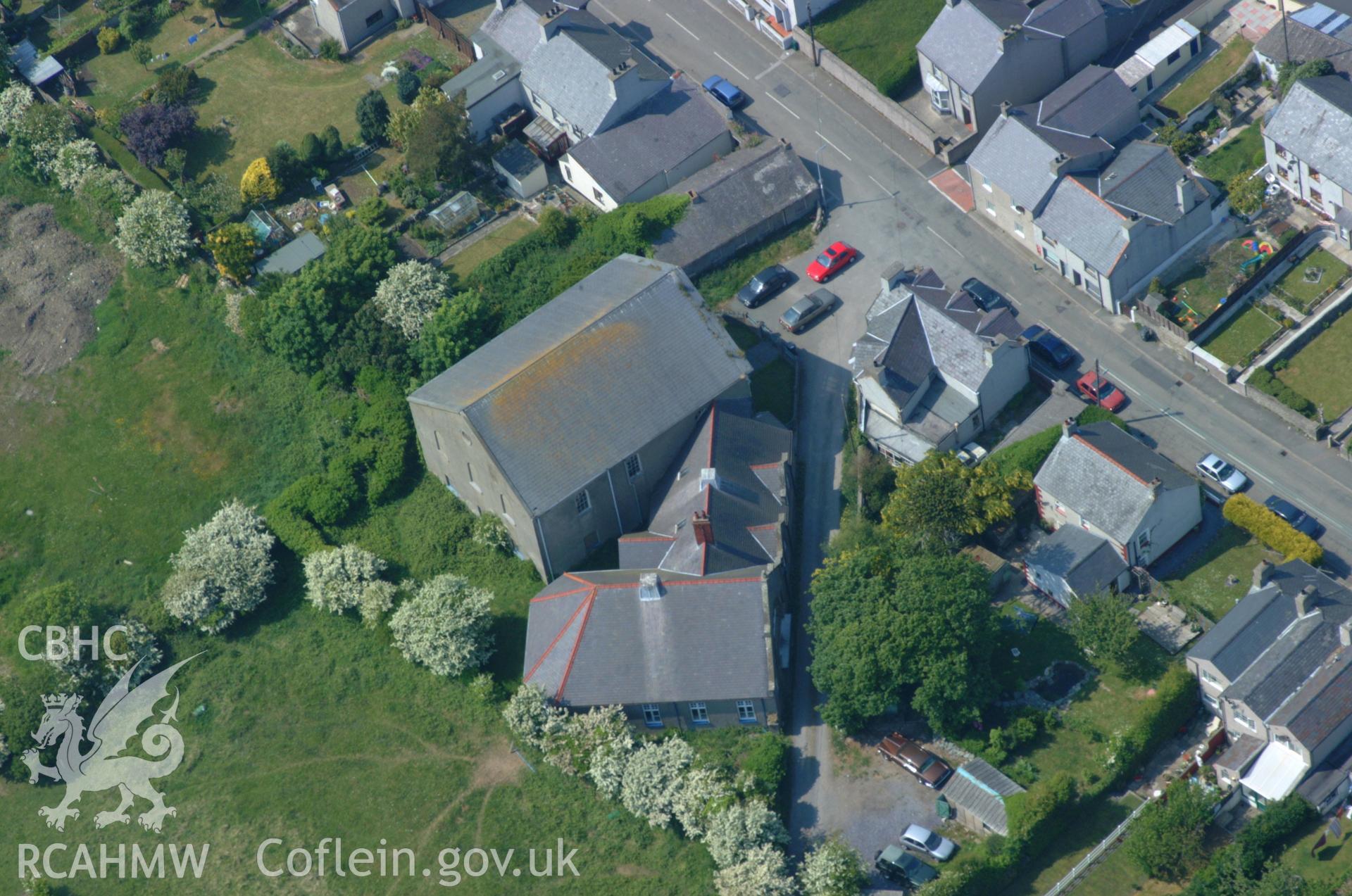 RCAHMW colour oblique aerial photograph of Carmel Welsh Independent Chapel, Porth Amlwch taken on 26/05/2004 by Toby Driver