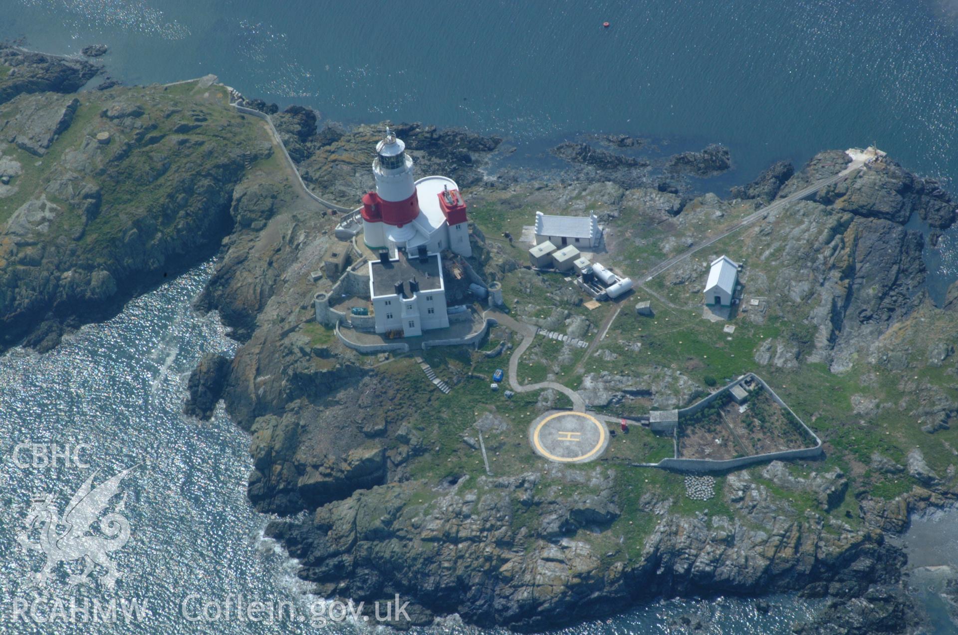 RCAHMW colour oblique aerial photograph of the Skerries Lighthouse taken on 26/05/2004 by Toby Driver