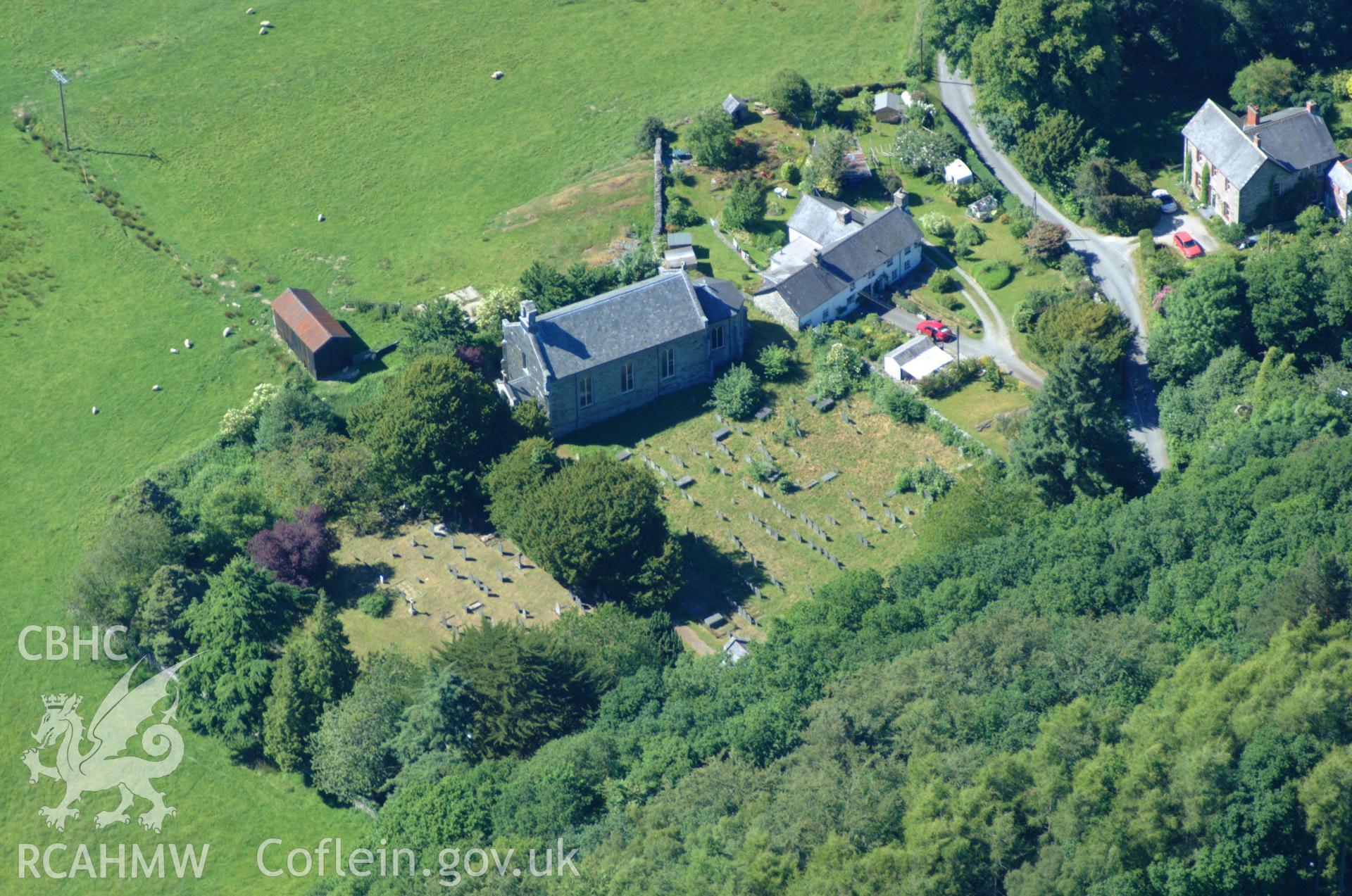 RCAHMW colour oblique aerial photograph of St Michaels Church, Ysgubor-y-coed, Eglwysfach taken on 14/06/2004 by Toby Driver