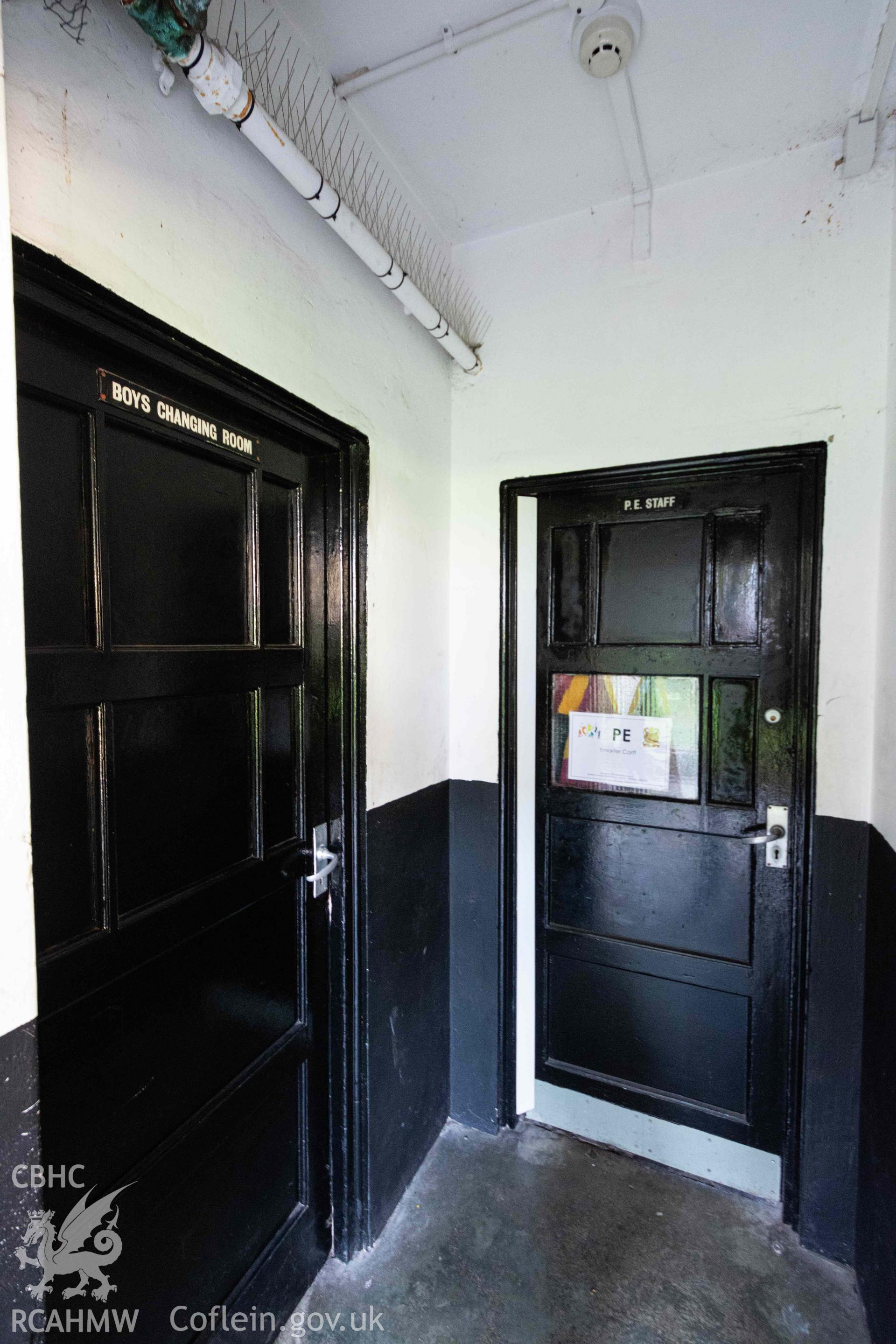 Doorways to boys gymnasium. 'Boys Changing Room' and 'P.E. Staff'. Bishop Gore School, Swansea