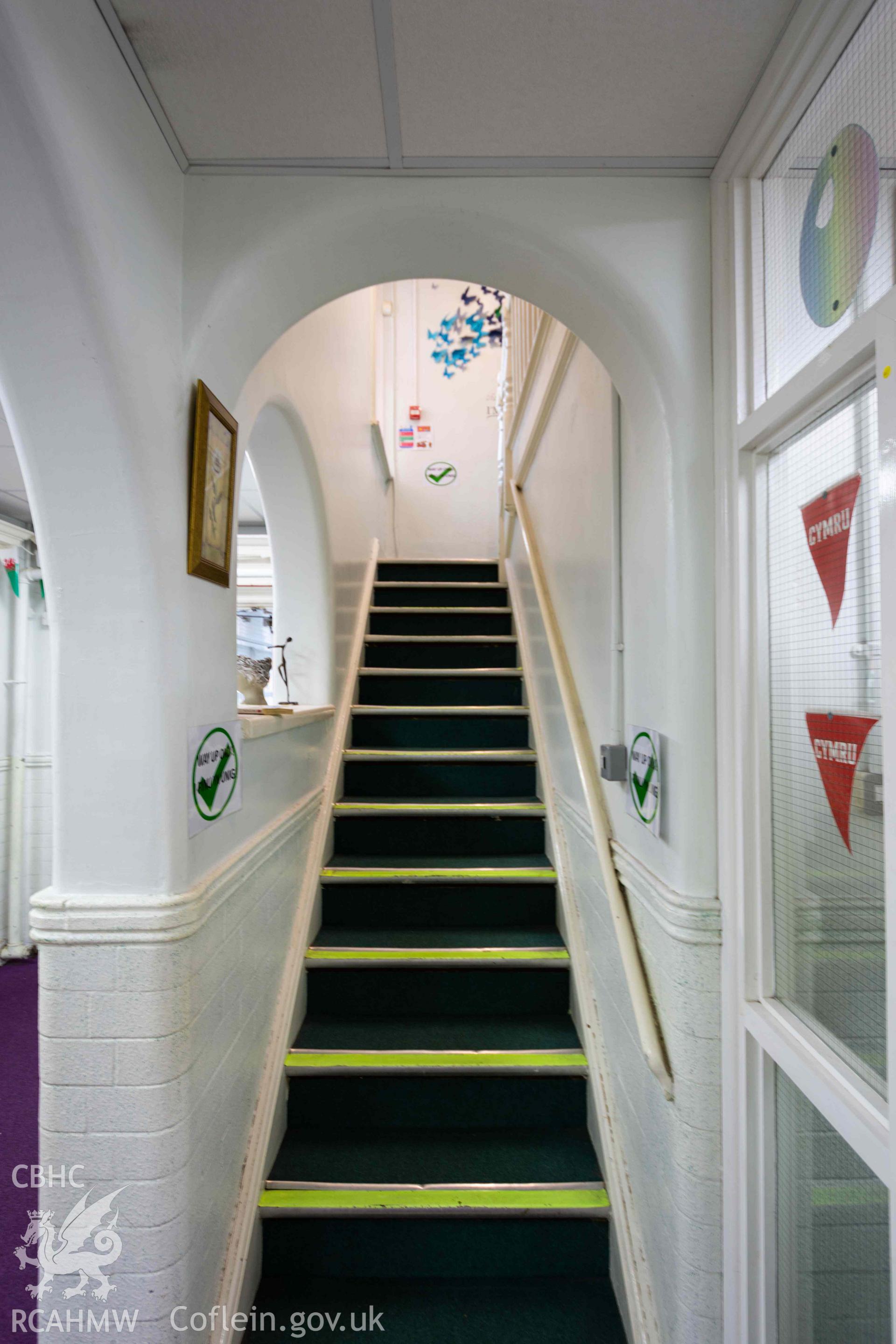 Arched staircase at reception area to admin offices on first floor. Looking north east. Rhiwbeina Primary School