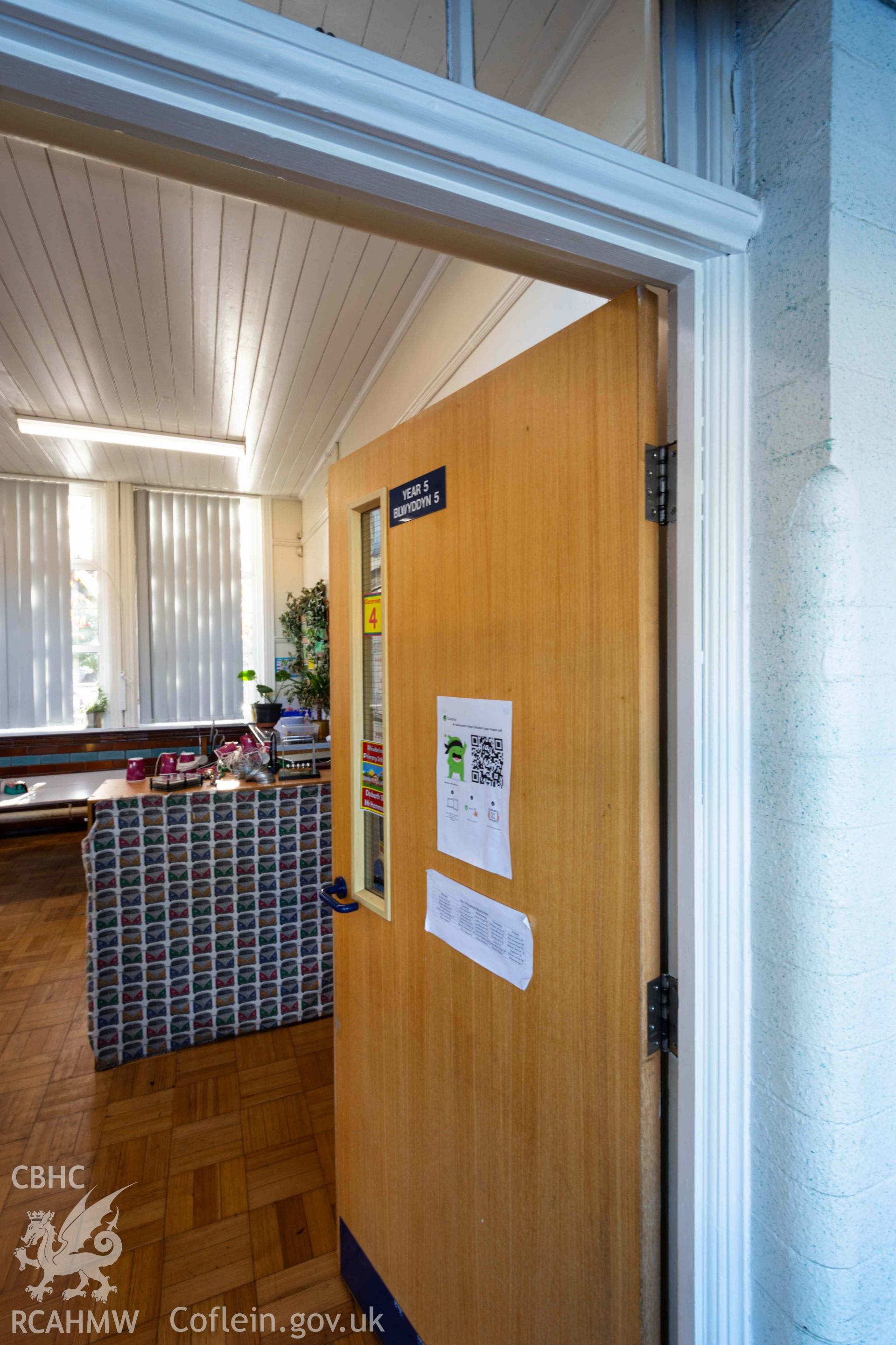 Door ajar, year 5 classroom. North east wing (original boys' department). Rhiwbeina Primary School