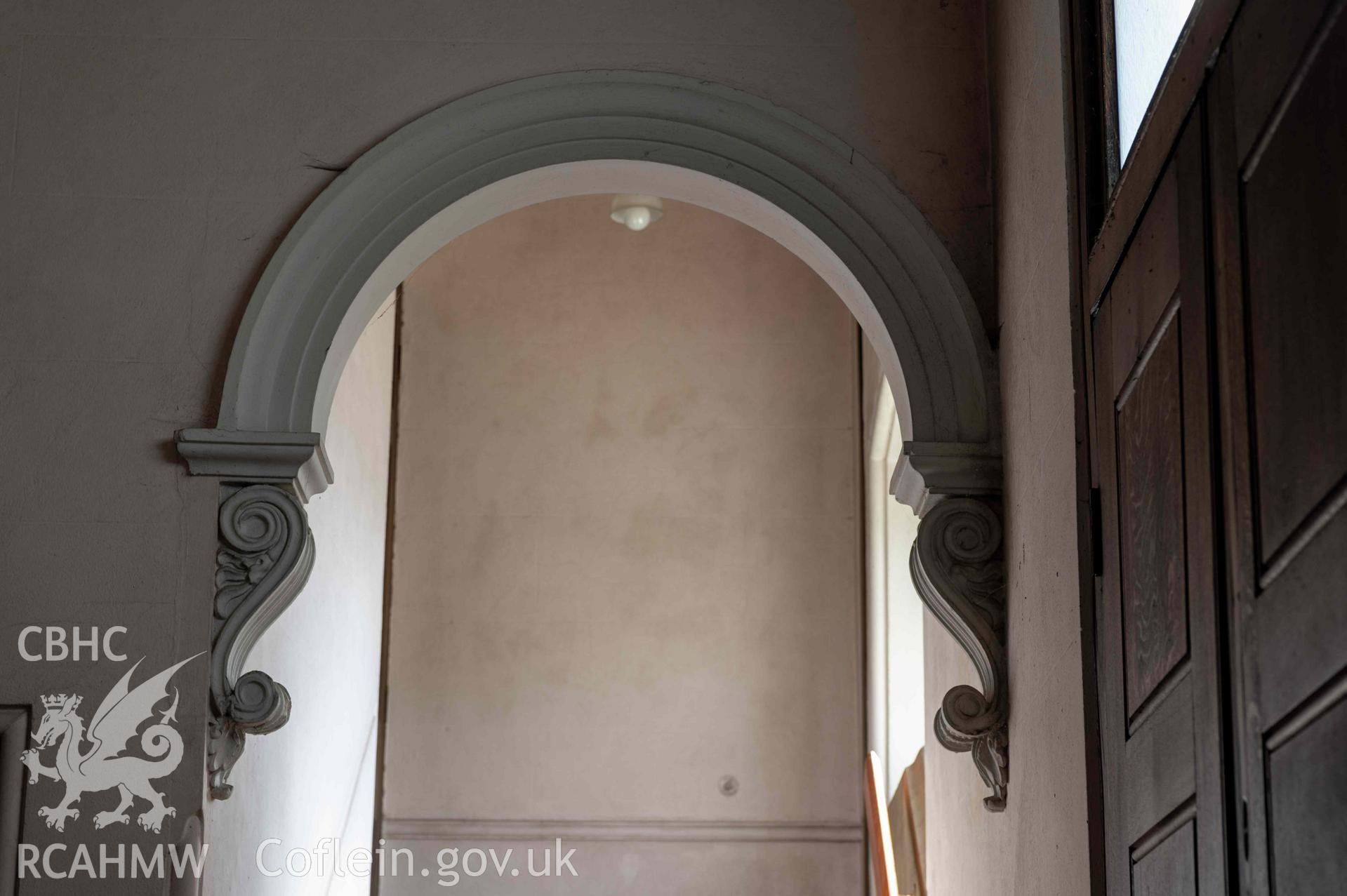 Capel Zion Baptist Chapel, Newtown - vestibule detail of archway head to gallery stairs.