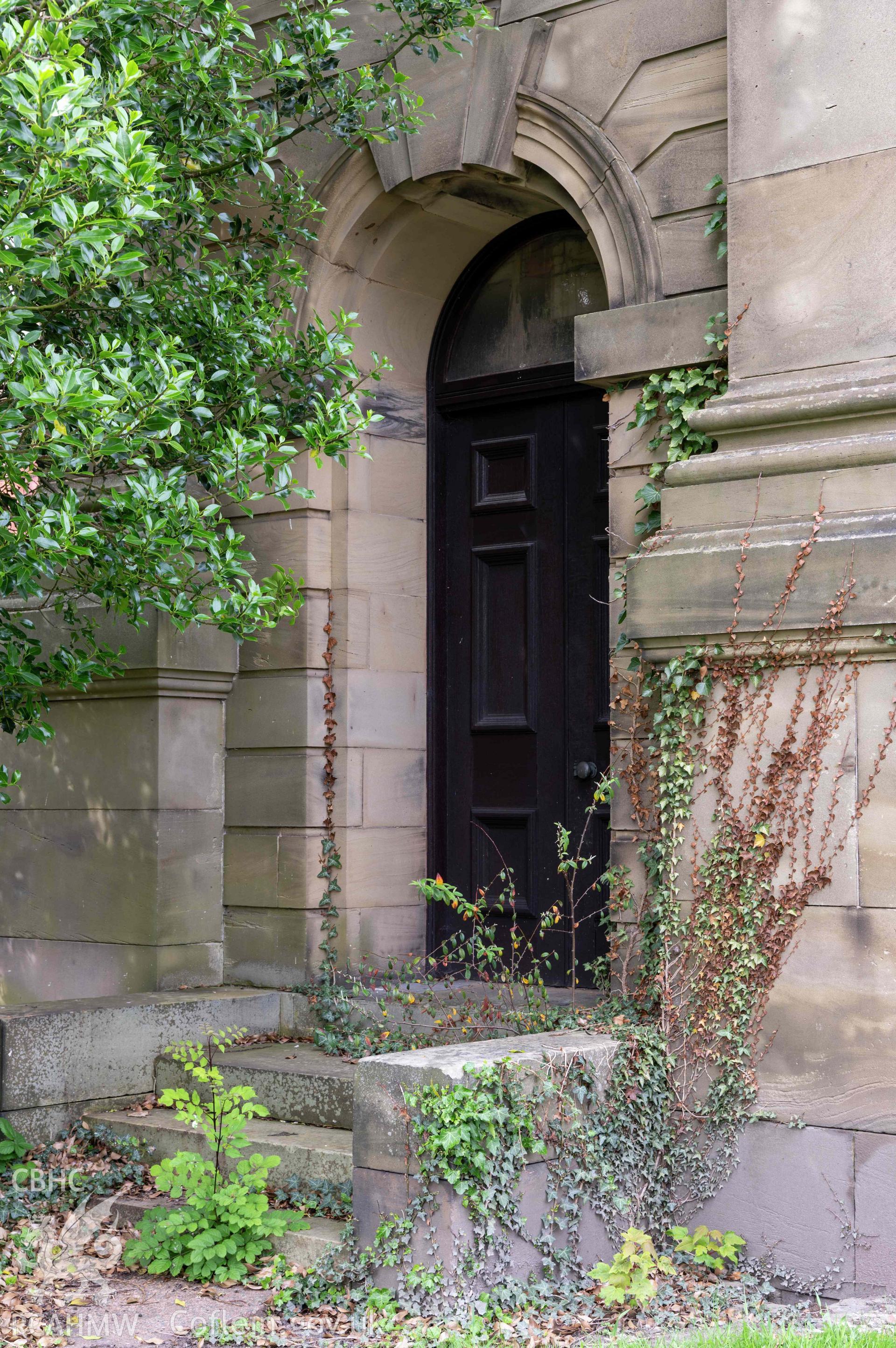 Capel Zion Baptist Chapel, Newtown - exterior detail of doorway in south corner of western elevation to basement stairs.