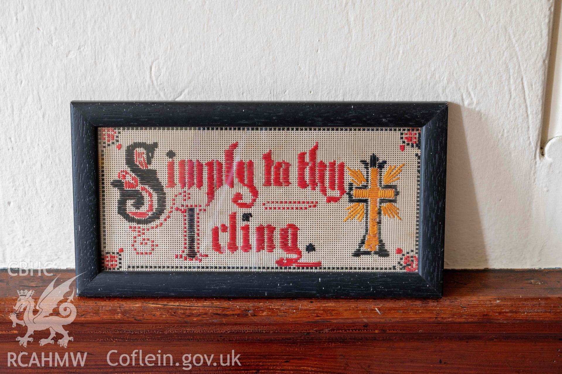 Capel Zion Baptist Chapel, Newtown - north-central basement room detail of cross-stitch sampler 'Simply to thy I Cling'.