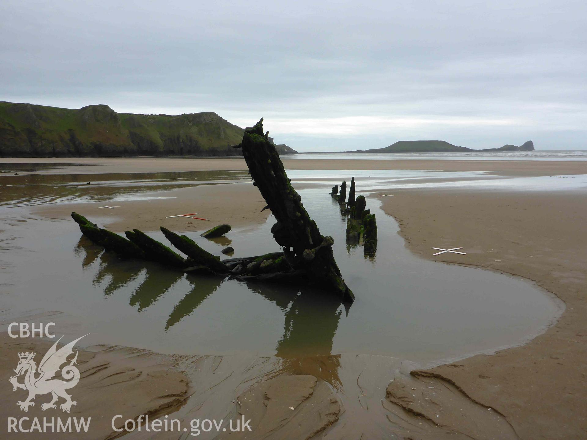 The wreck of the HELVETIA on 08/04/2024, looking southwest with Worms Head in the background. Photographed as part of a digital photographic survey conducted by Julian Whitewright on 8 April 2024.