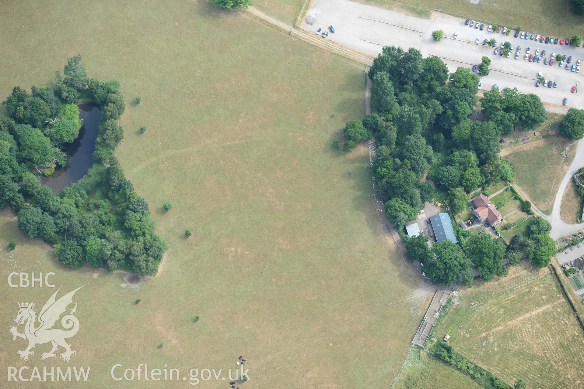 Car park at Chirk Castle. Oblique aerial photograph taken during the Royal Commission’s programme of archaeological aerial reconnaissance by Toby Driver on 10 July 2018.