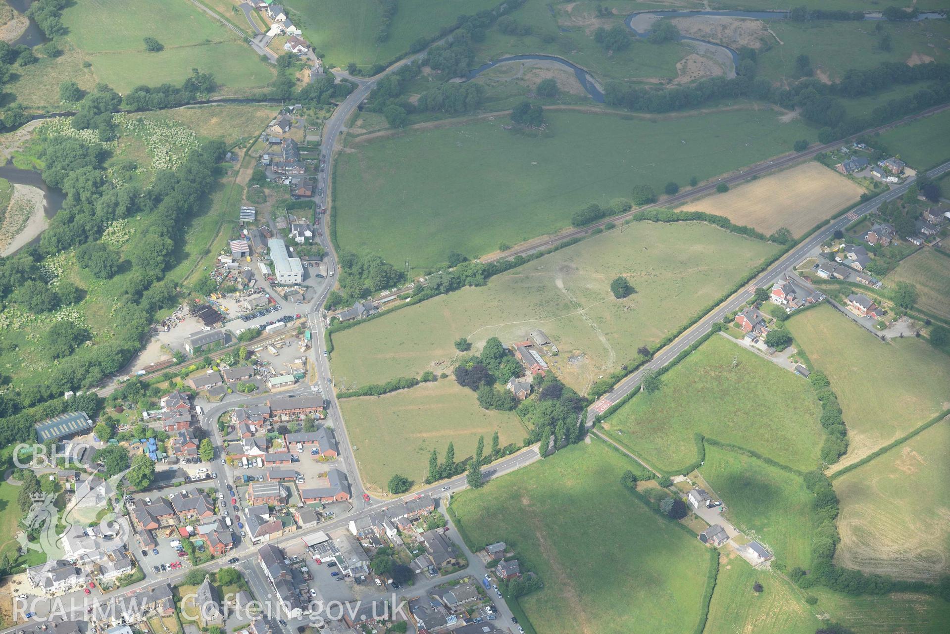 Caersws Roman Fort. Oblique aerial photograph taken during the Royal Commission’s programme of archaeological aerial reconnaissance by Toby Driver on 10 July 2018.