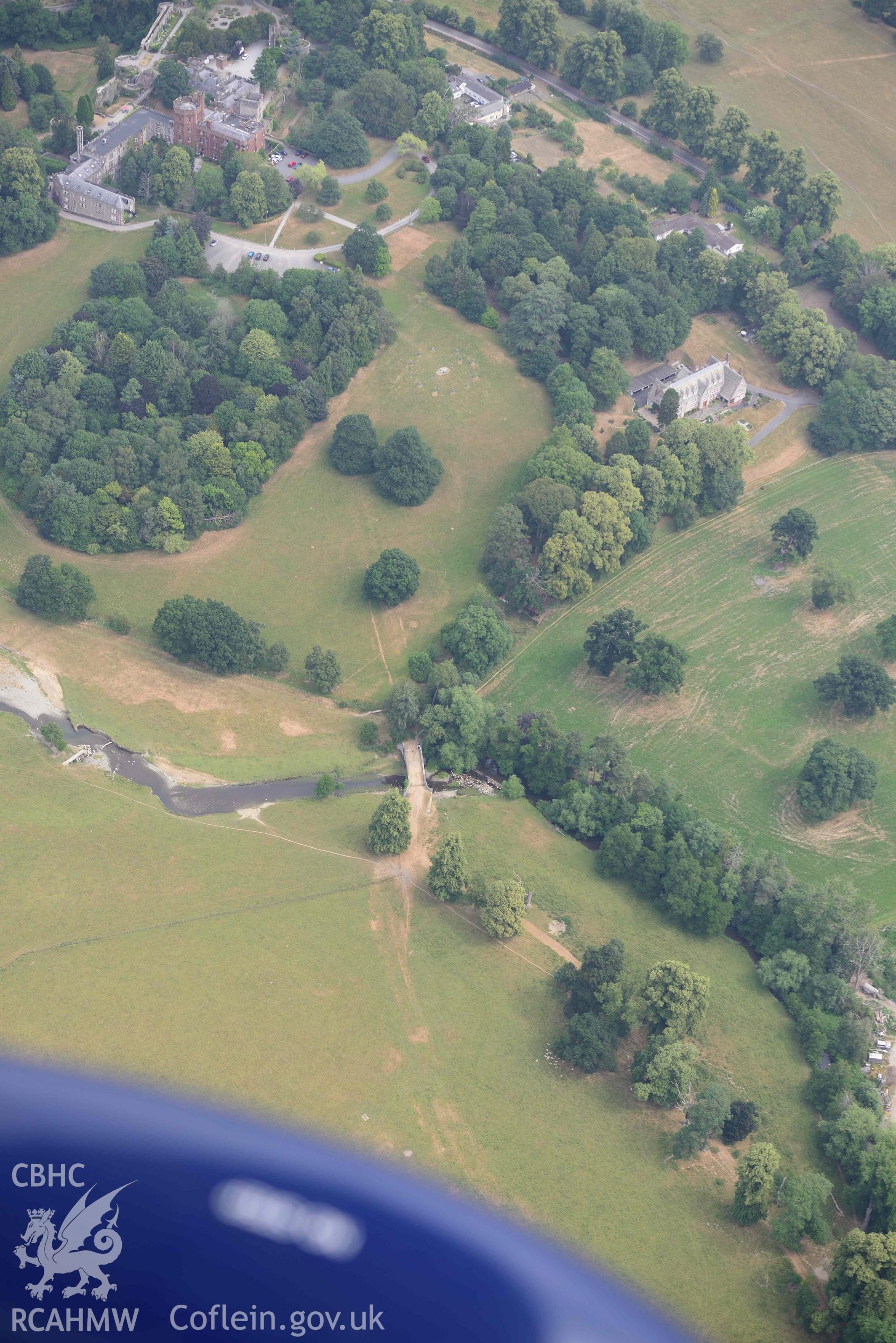 Ruthin Castle and Gardens. Oblique aerial photograph taken during the Royal Commission’s programme of archaeological aerial reconnaissance by Toby Driver on 10 July 2018.