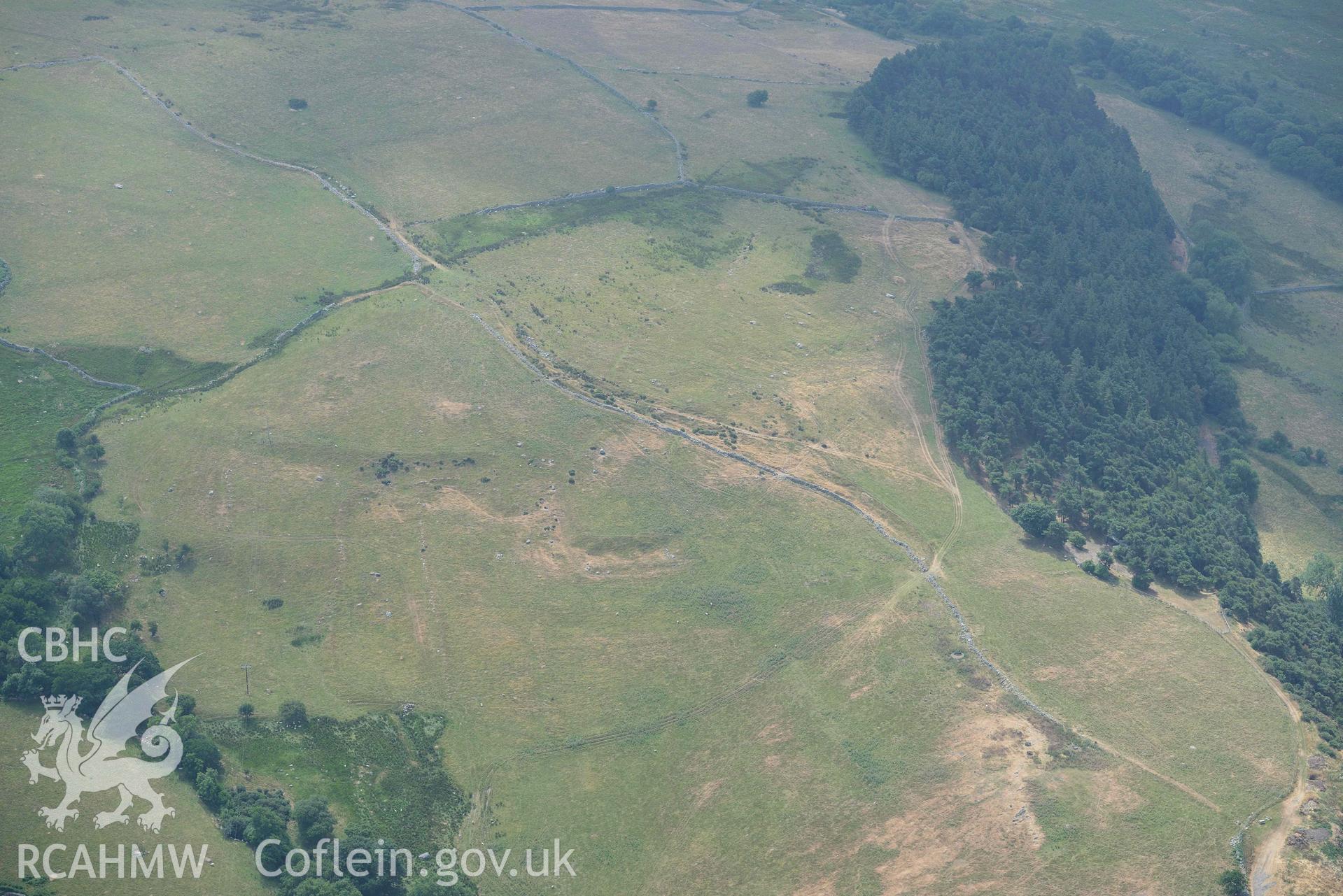 Caer Haidd field system. Oblique aerial photograph taken during the Royal Commission’s programme of archaeological aerial reconnaissance by Toby Driver on 10 July 2018.