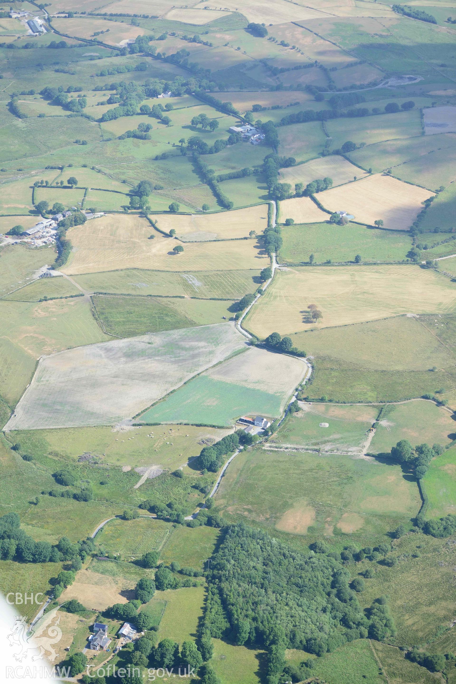 Damage to Sarn Helen Rhyd Fudr. Oblique aerial photograph taken during the Royal Commission’s programme of archaeological aerial reconnaissance by Toby Driver on 10 July 2018.