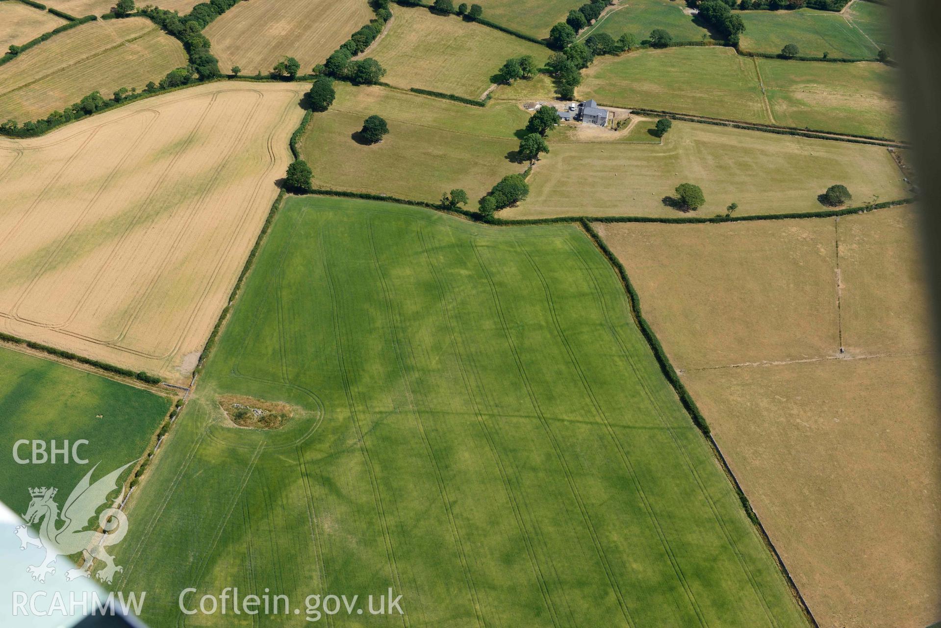 Rhostryfan cropmarks. Oblique aerial photograph taken during the Royal Commission’s programme of archaeological aerial reconnaissance by Toby Driver on 10 July 2018.