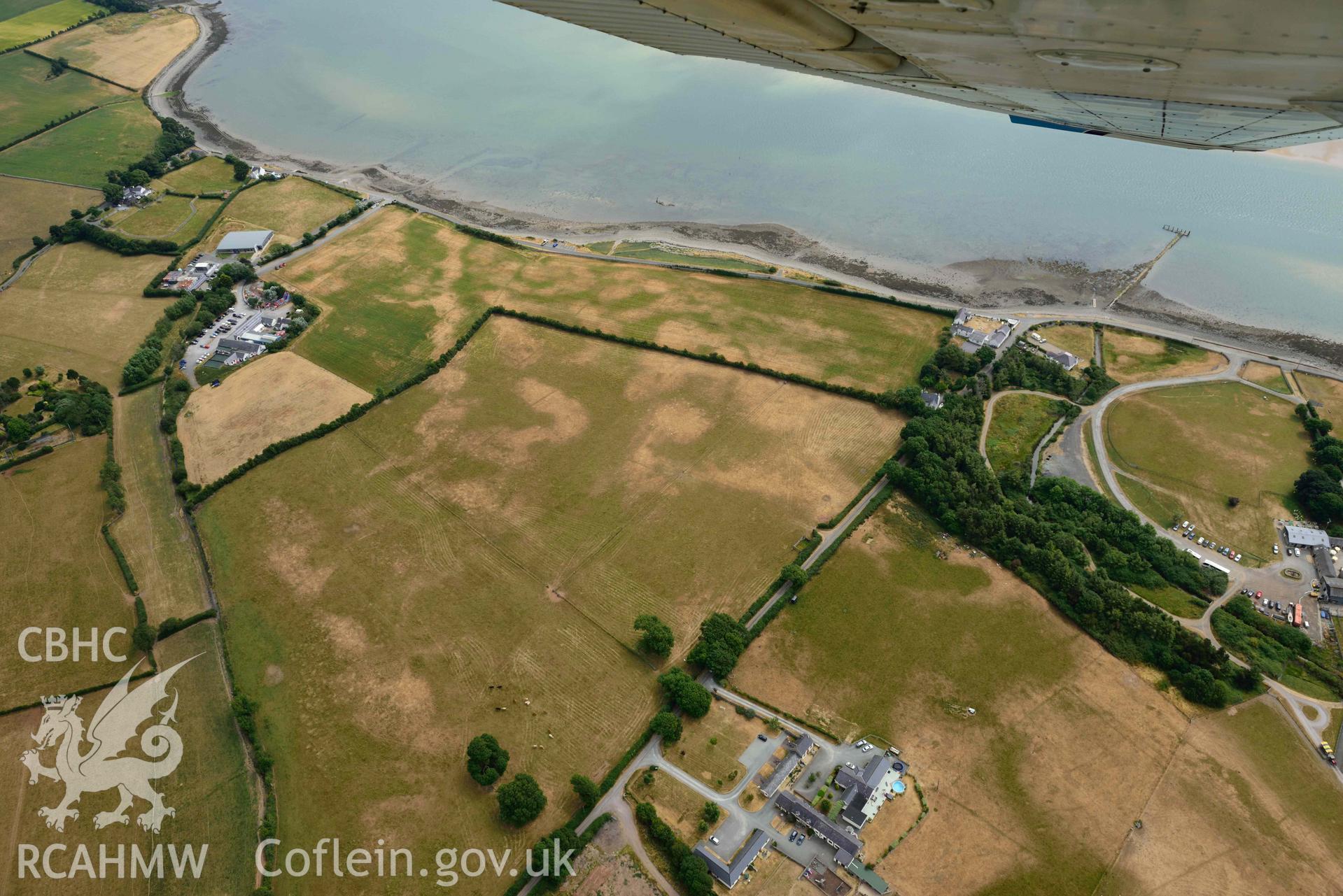 Plas Farm early field systems. Oblique aerial photograph taken during the Royal Commission’s programme of archaeological aerial reconnaissance by Toby Driver on 10 July 2018.