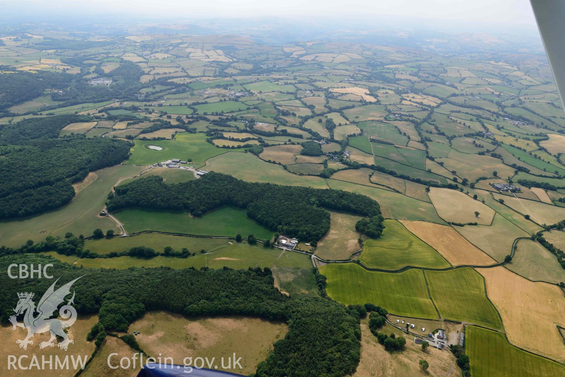 Betws Lodge cropmarks. Oblique aerial photograph taken during the Royal Commission’s programme of archaeological aerial reconnaissance by Toby Driver on 10 July 2018.