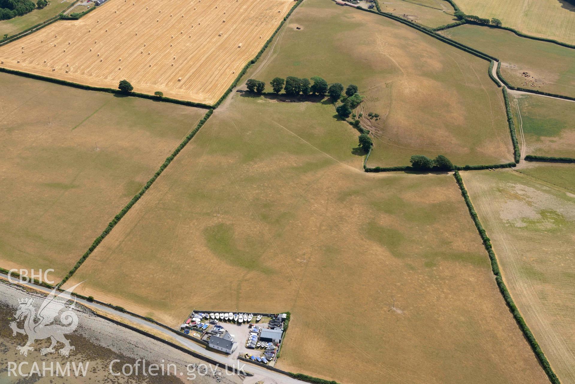 Plas Farm early field systems. Oblique aerial photograph taken during the Royal Commission’s programme of archaeological aerial reconnaissance by Toby Driver on 10 July 2018.