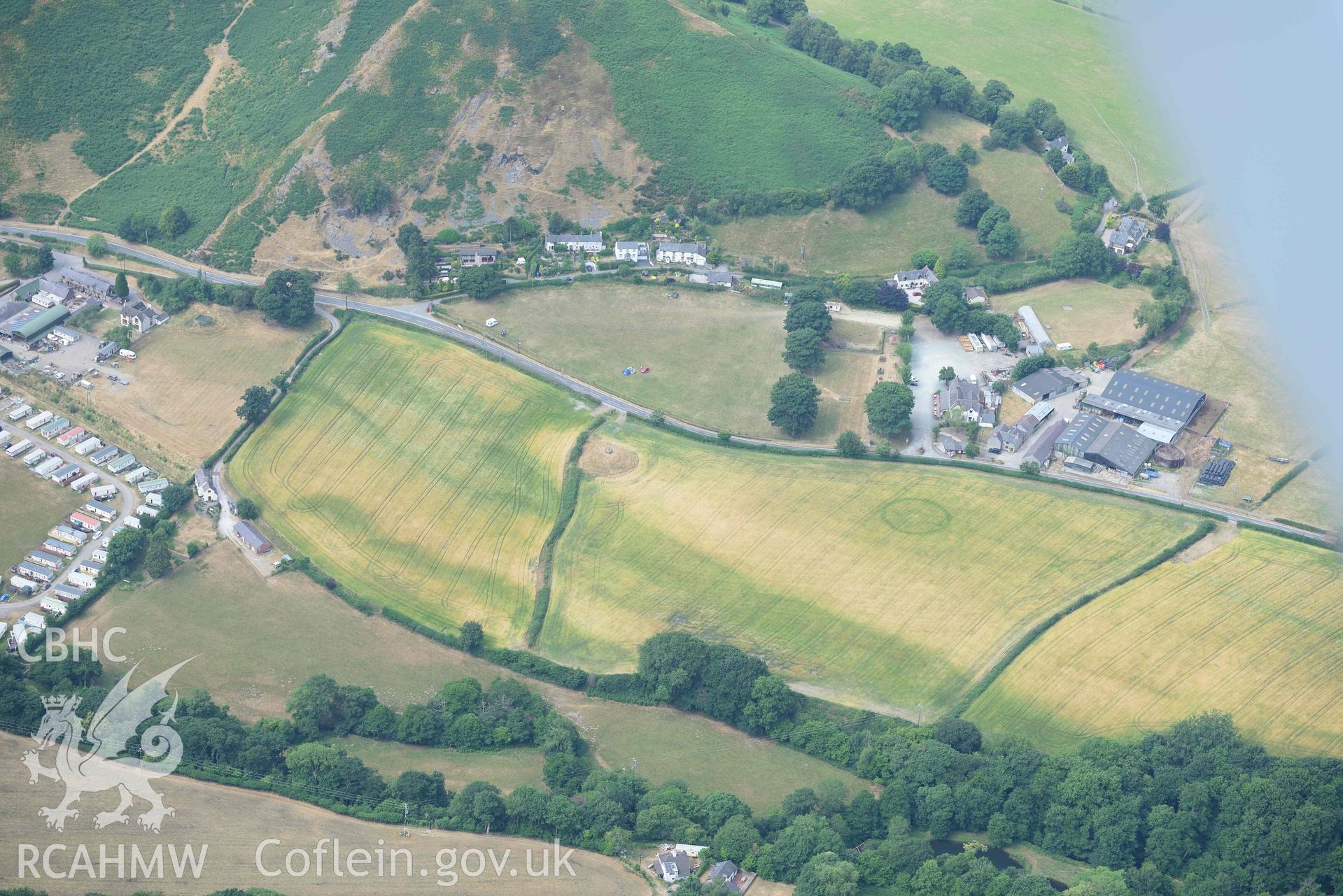 Pillar of Eliseg and Eliseg Ring Ditch. Oblique aerial photograph taken during the Royal Commission’s programme of archaeological aerial reconnaissance by Toby Driver on 10 July 2018.