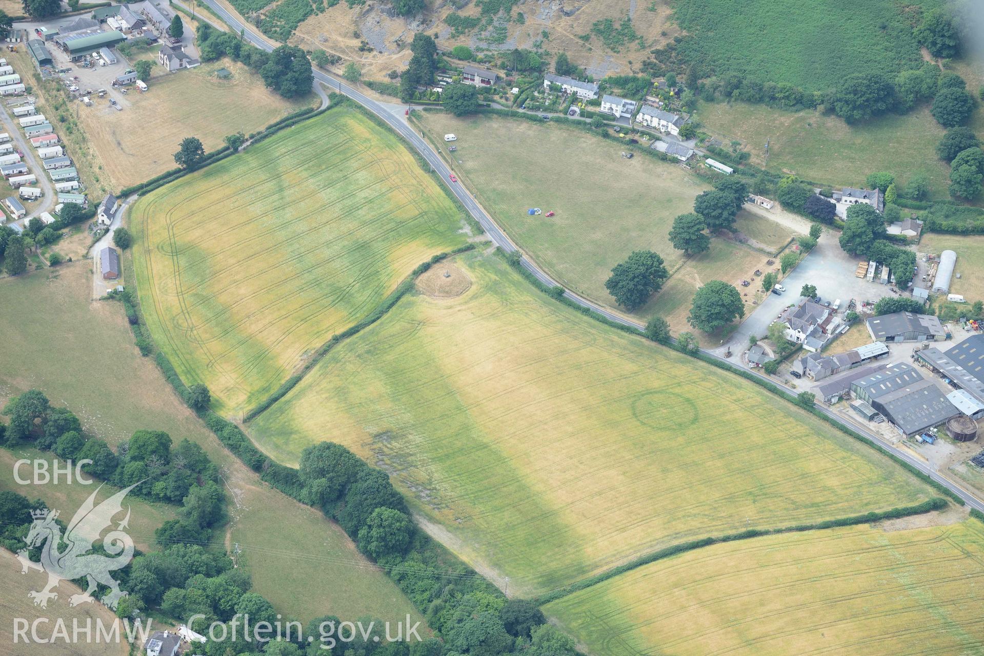 Pillar of Eliseg and Eliseg Ring Ditch. Oblique aerial photograph taken during the Royal Commission’s programme of archaeological aerial reconnaissance by Toby Driver on 10 July 2018.