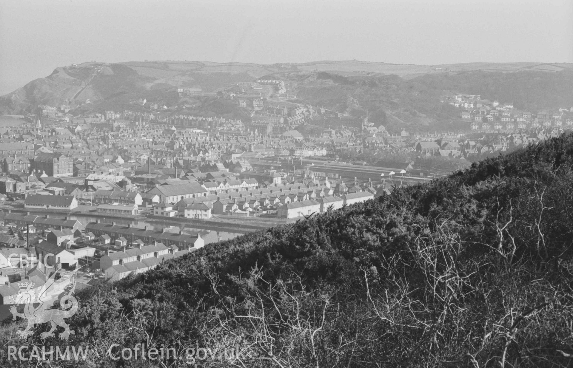 Digital copy of a black and white negative showing view of Aberystwyth and Trefechan from the north end of Pendinas. Photographed by Arthur Chater on 3 April 1969. Looking north east from Grid Reference SN 5830 8078.