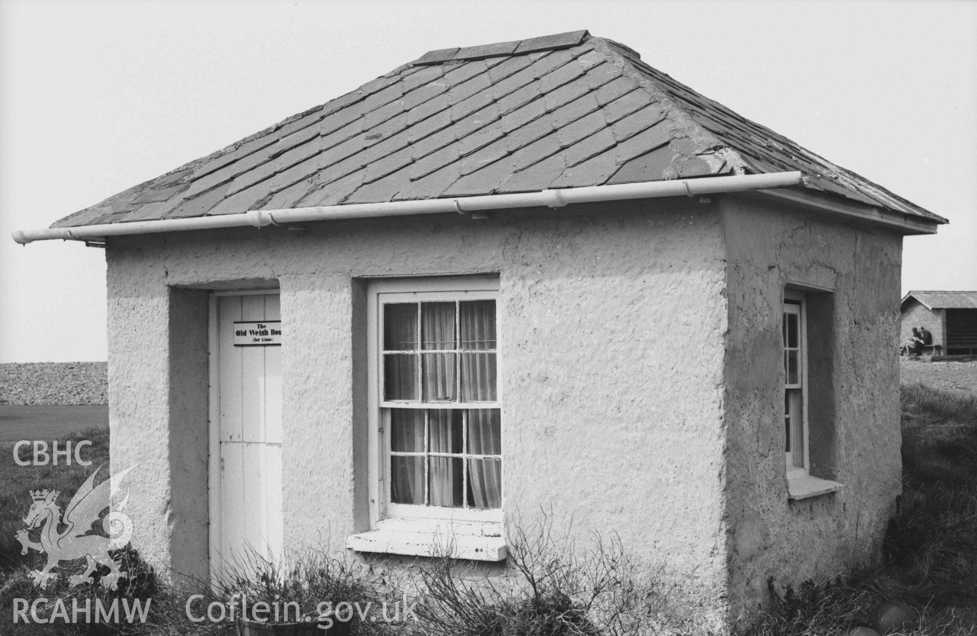 Digital copy of a black and white negative showing the Old Weigh House, at the west corner of Aberaeron harbour (for weighing lime). Photographed by Arthur Chater on 3 April 1969. Looking west north west from Grid Reference SN 4545 6288.