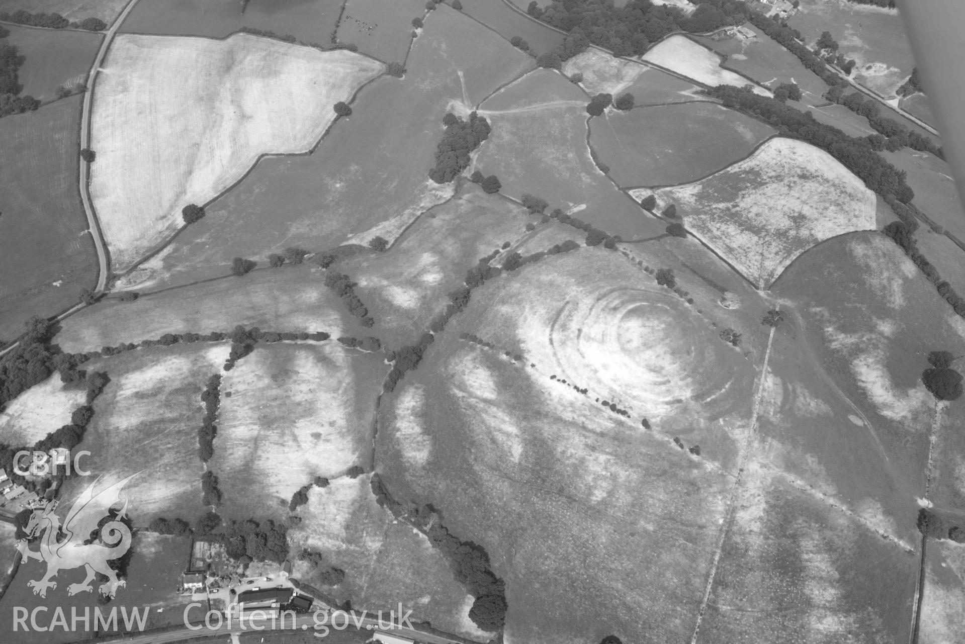 Pentre Camp. Oblique black and white aerial photograph taken during the Royal Commission’s programme of archaeological aerial reconnaissance by Toby Driver on 10 July 2018.