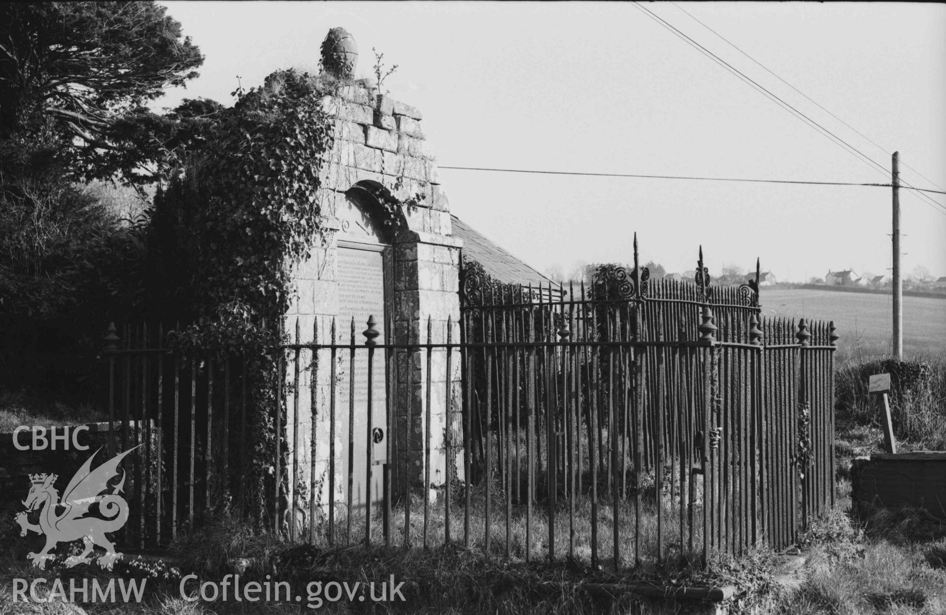 Digital copy of a black and white negative showing tomb at Troedyraur churchyard. Photographed by Arthur Chater on 5 April 1969.