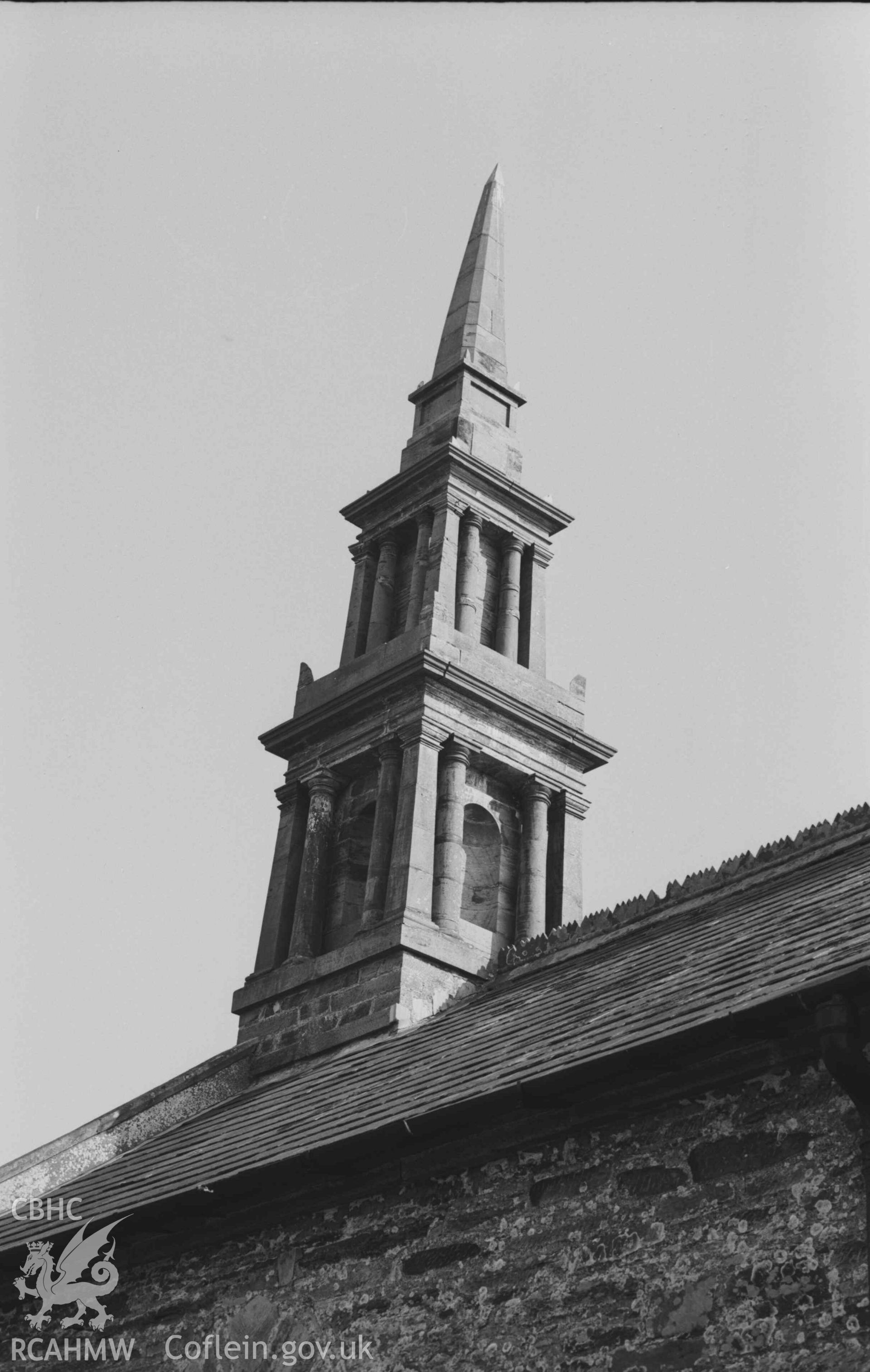 Digital copy of a black and white negative showing spire of St Cynllo's church. Photographed by Arthur Chater on 7 April 1969. Looking south east from Grid Reference SN 1995 4581.