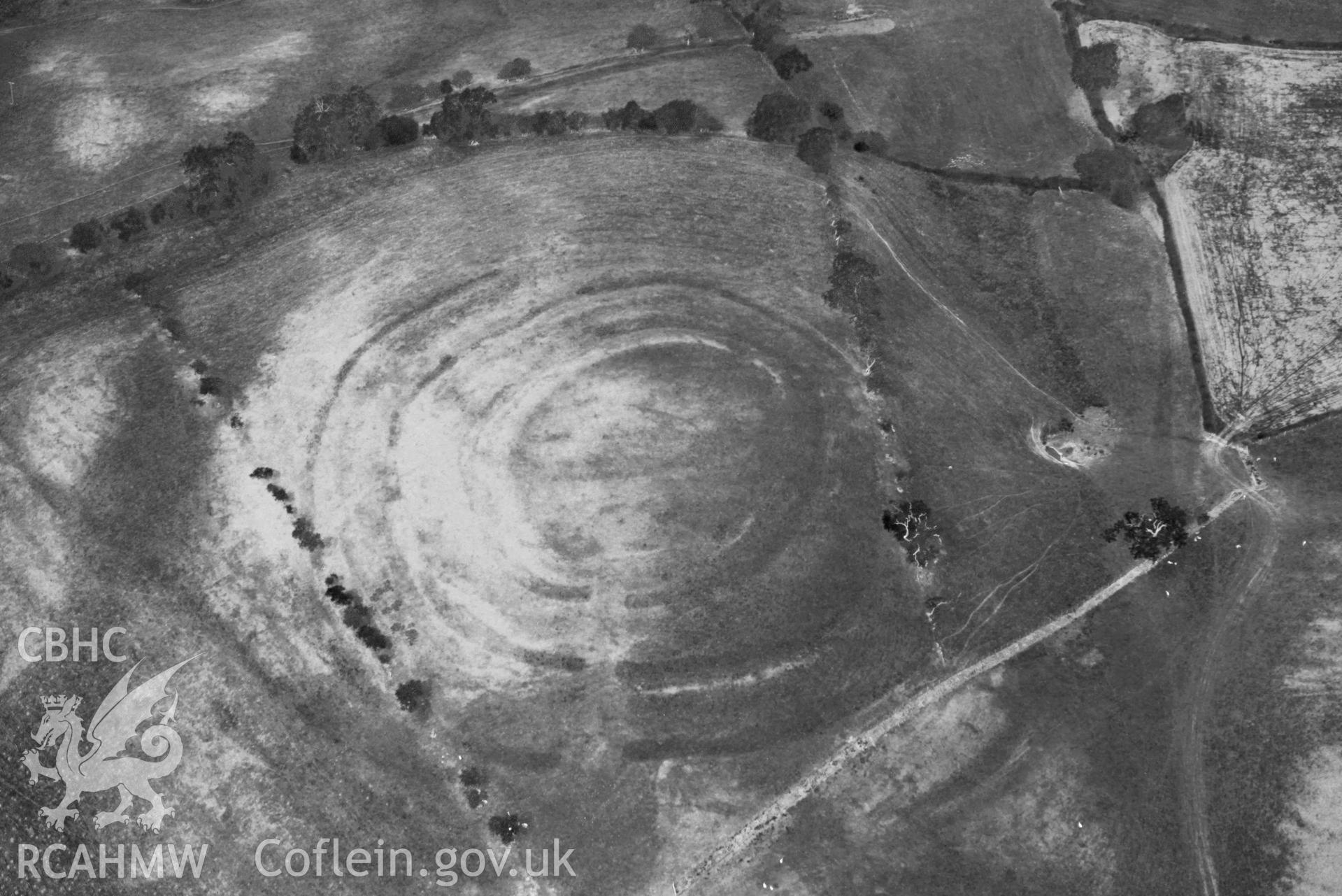 Pentre Camp. Oblique black and white aerial photograph taken during the Royal Commission’s programme of archaeological aerial reconnaissance by Toby Driver on 10 July 2018.