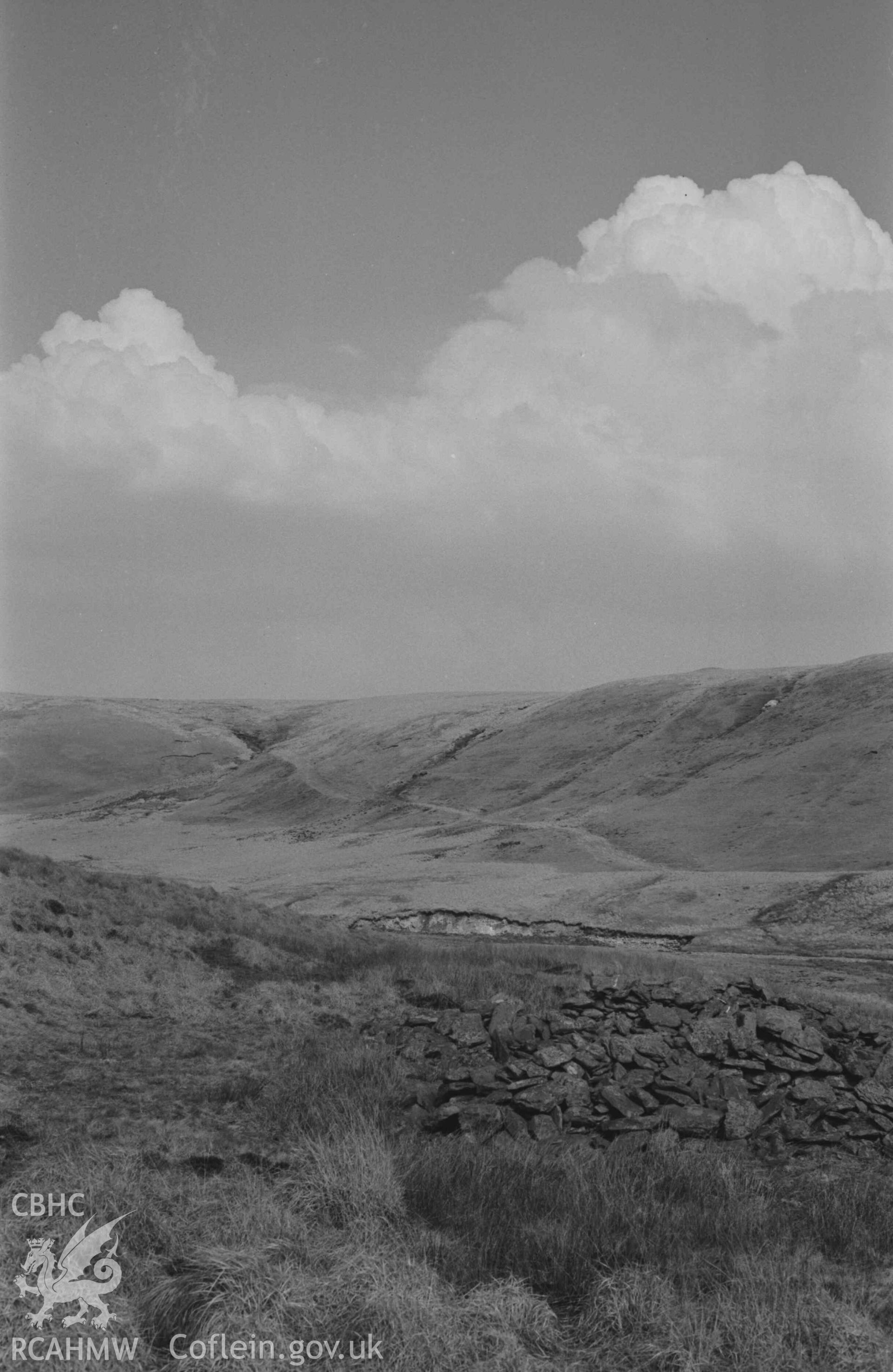 Digital copy of a black and white negative showing view past the ruin of Hengae to Rhyd Hengae. Photographed by Arthur Chater on 8 April 1969. Looking east north east from Grid Reference SN 8201 6806.